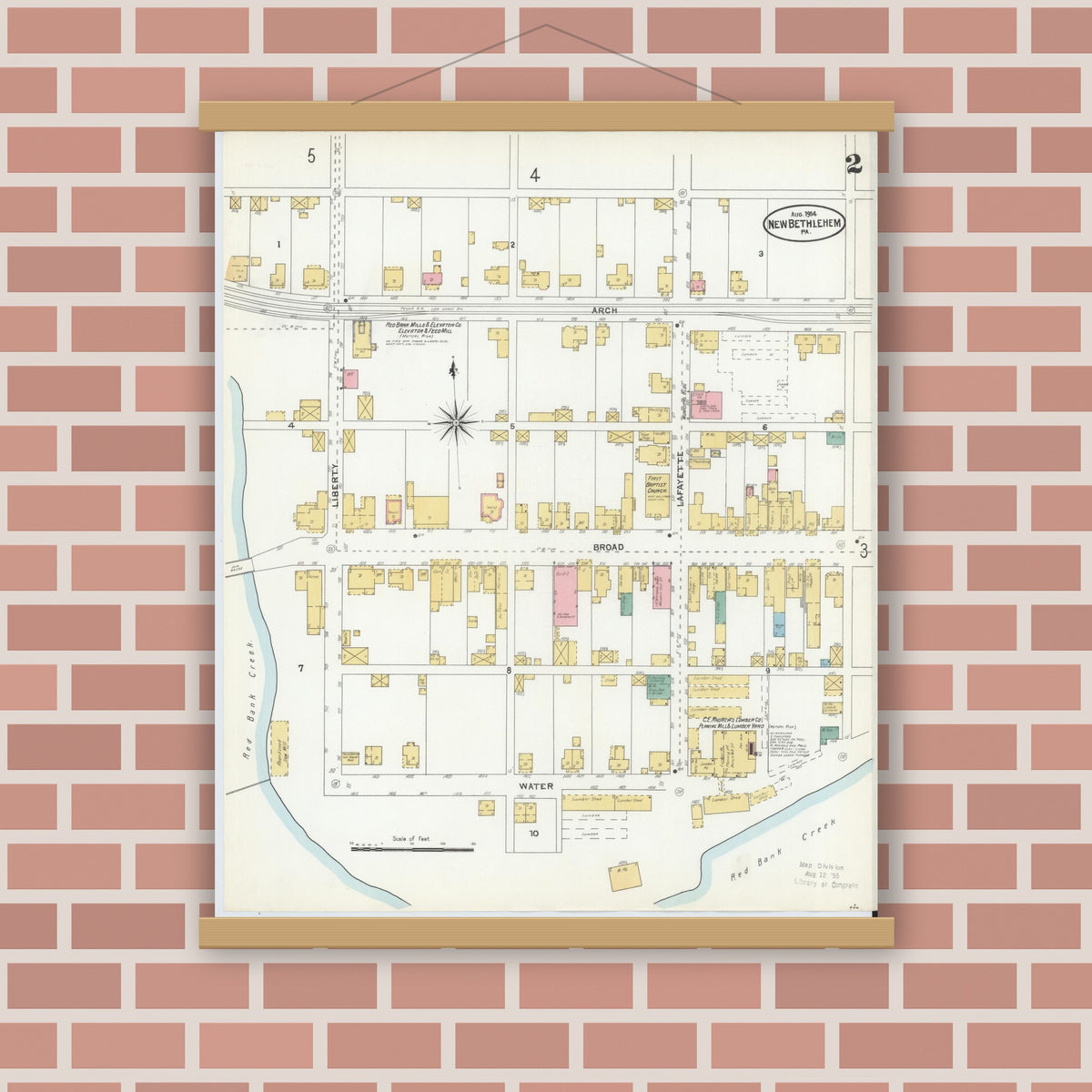 Old map wall art mockup — magnetic wood frame on brick wall — Sanborn Fire Insurance Map from New Bethlehem, Clarion County, Pennsylvania (1904), Sheet #0002