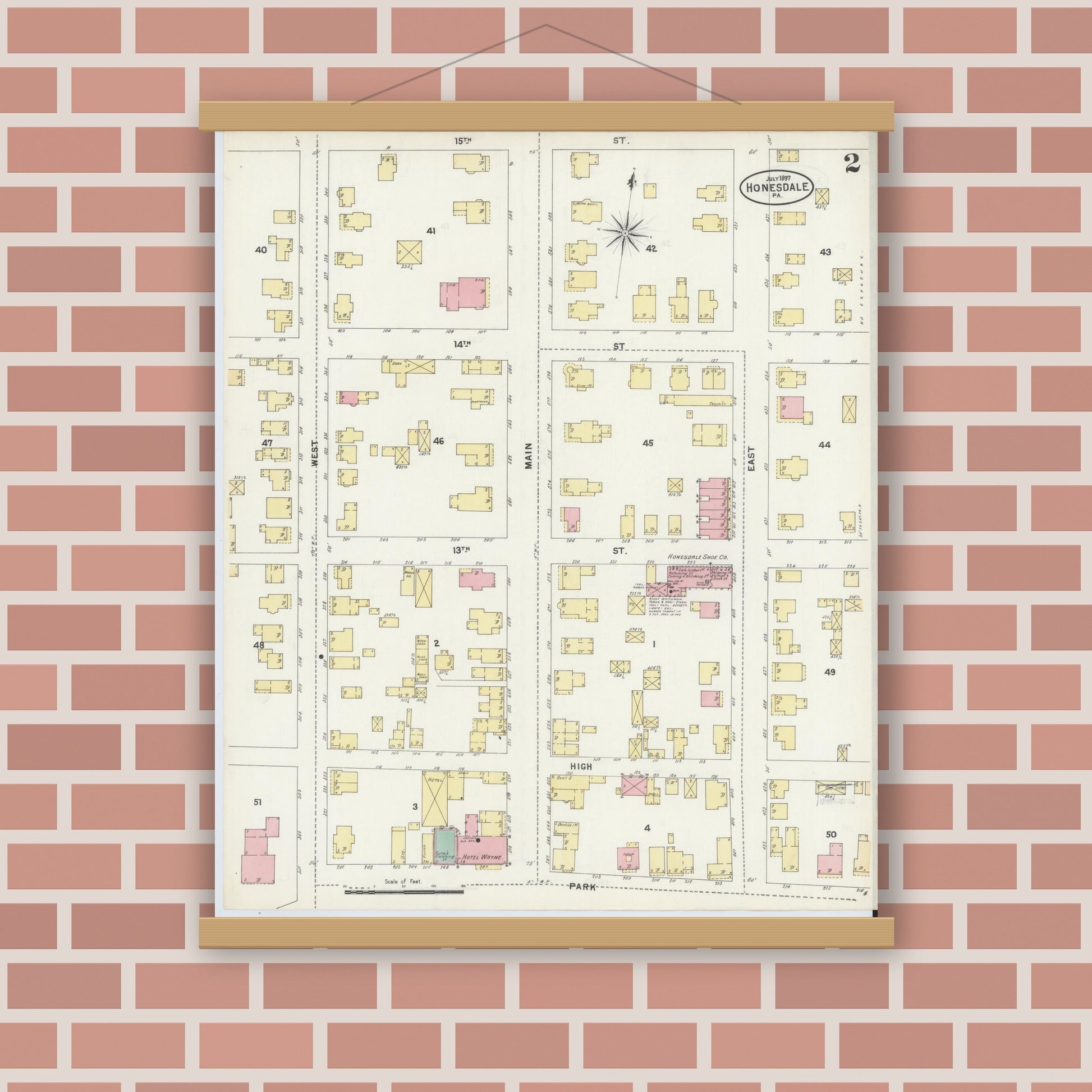 Old map wall art mockup — magnetic wood frame on brick wall — Sanborn Fire Insurance Map from Honesdale, Wayne County, Pennsylvania (1897), Sheet #0002