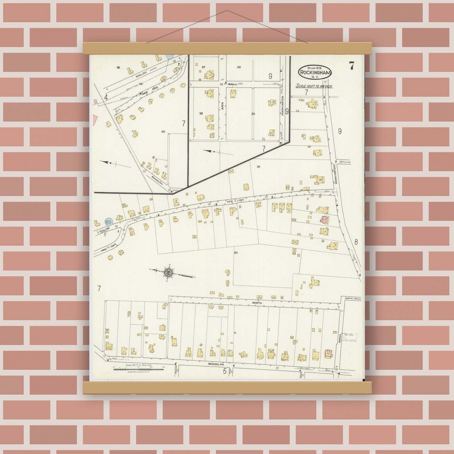 Old map wall art mockup — magnetic wood frame on brick wall — Sanborn Fire Insurance Map from Rockingham, Richmond County, North Carolina (1918), Sheet #0007