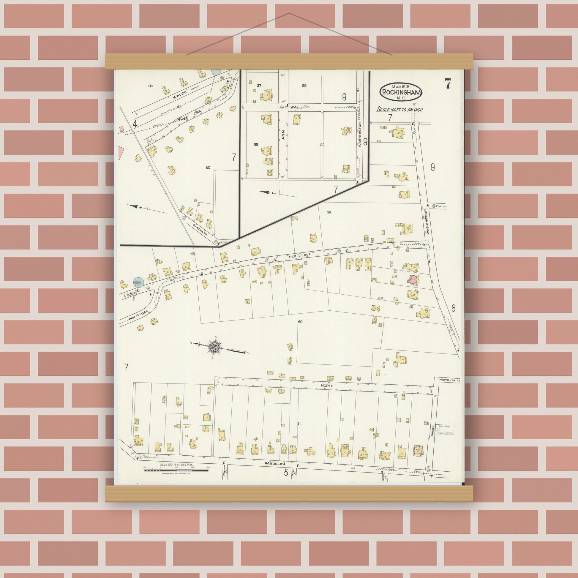 Old map wall art mockup — magnetic wood frame on brick wall — Sanborn Fire Insurance Map from Rockingham, Richmond County, North Carolina (1918), Sheet #0007
