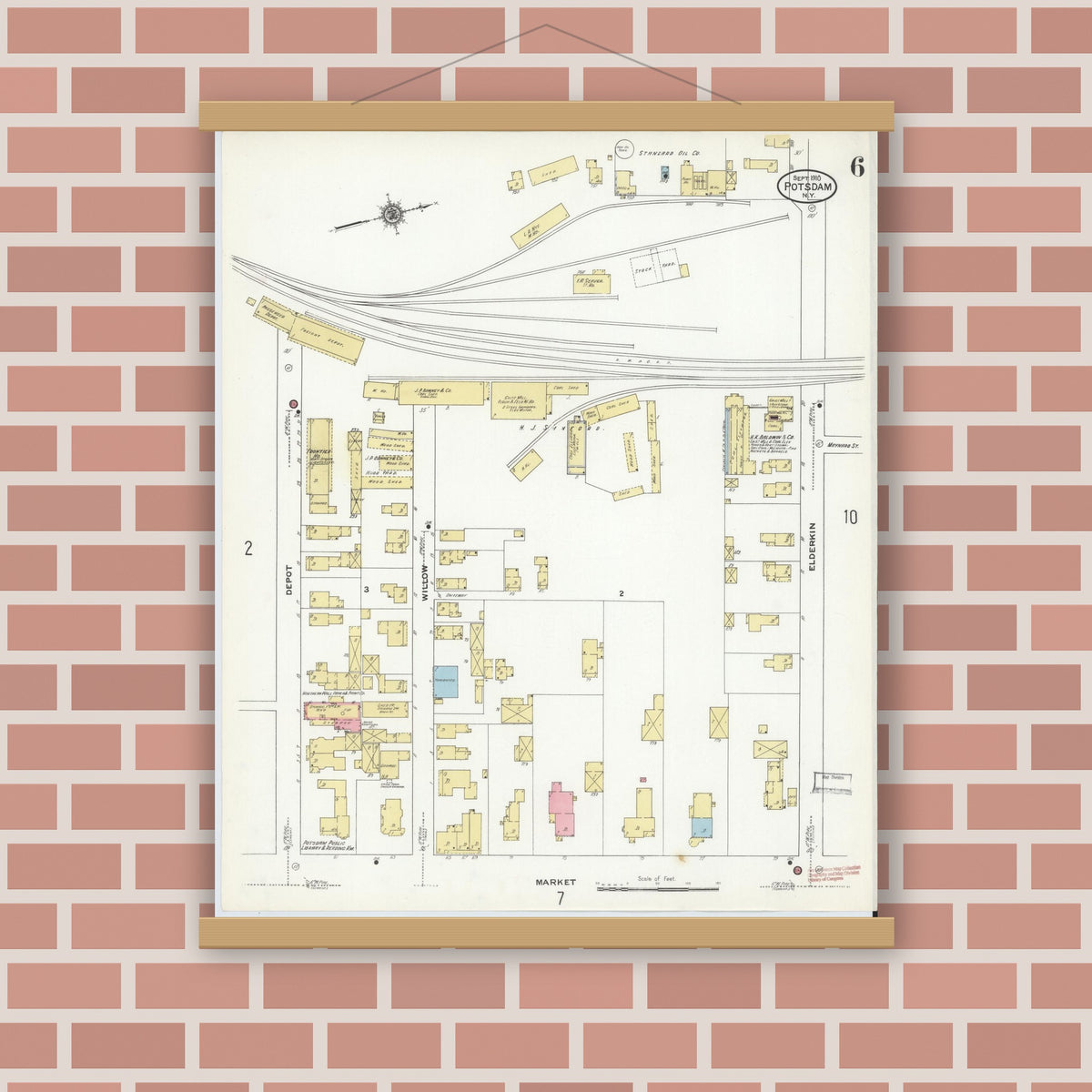 Old map wall art mockup — magnetic wood frame on brick wall — Sanborn Fire Insurance Map from Potsdam, St. Lawrence County, New York (1910), Sheet #0006