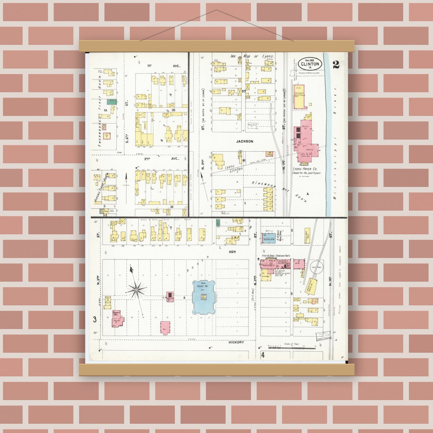 Old map wall art mockup — magnetic wood frame on brick wall — Sanborn Fire Insurance Map from Clinton, Clinton County, Iowa (1902), Sheet #0002