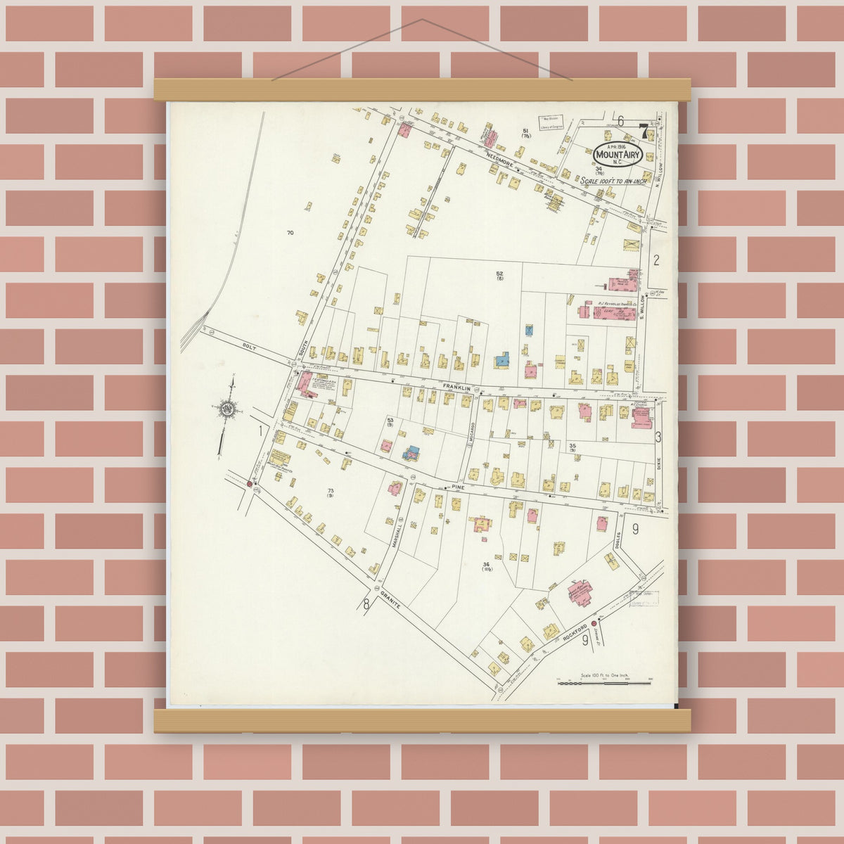 Old map wall art mockup — magnetic wood frame on brick wall — Sanborn Fire Insurance Map from Mount Airy, Surry County, North Carolina (1916), Sheet #0007