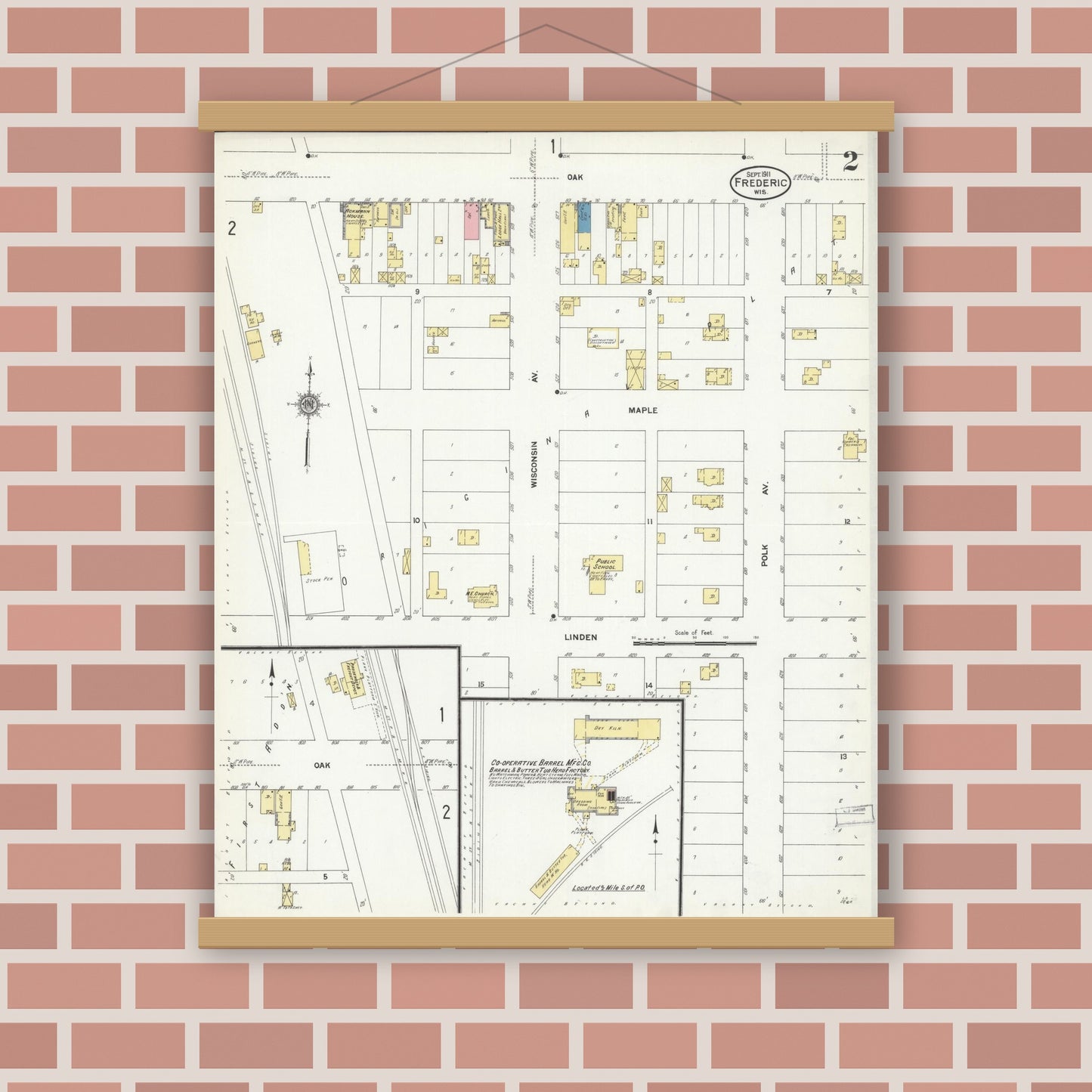 Old map wall art mockup — magnetic wood frame on brick wall — Sanborn Fire Insurance Map from Frederic, Polk County, Wisconsin (1911), Sheet #0002