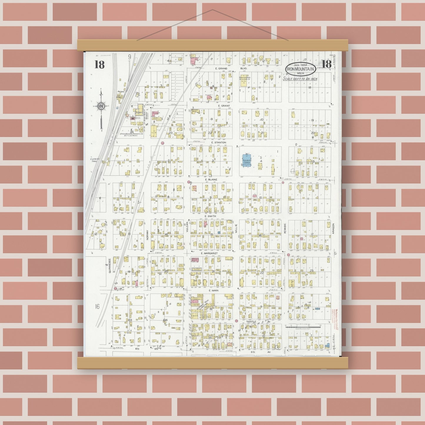 Old map wall art mockup — magnetic wood frame on brick wall — Sanborn Fire Insurance Map from Iron Mountain, Dickinson County, Michigan (1930), Sheet #0018