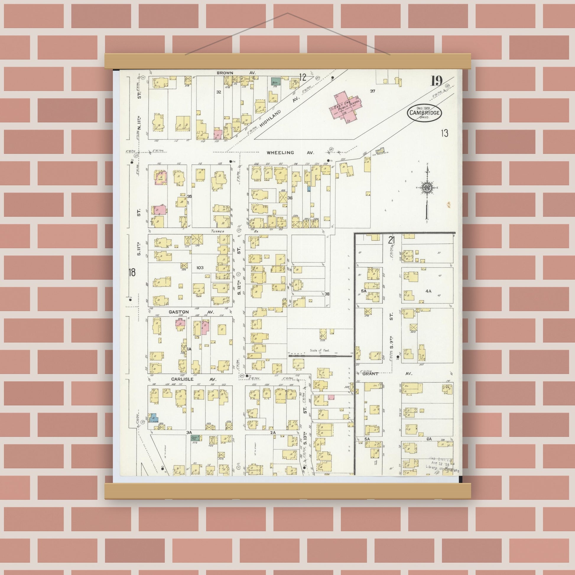 Old map wall art mockup — magnetic wood frame on brick wall — Sanborn Fire Insurance Map from Cambridge, Guernsey County, Ohio (1909), Sheet #0019