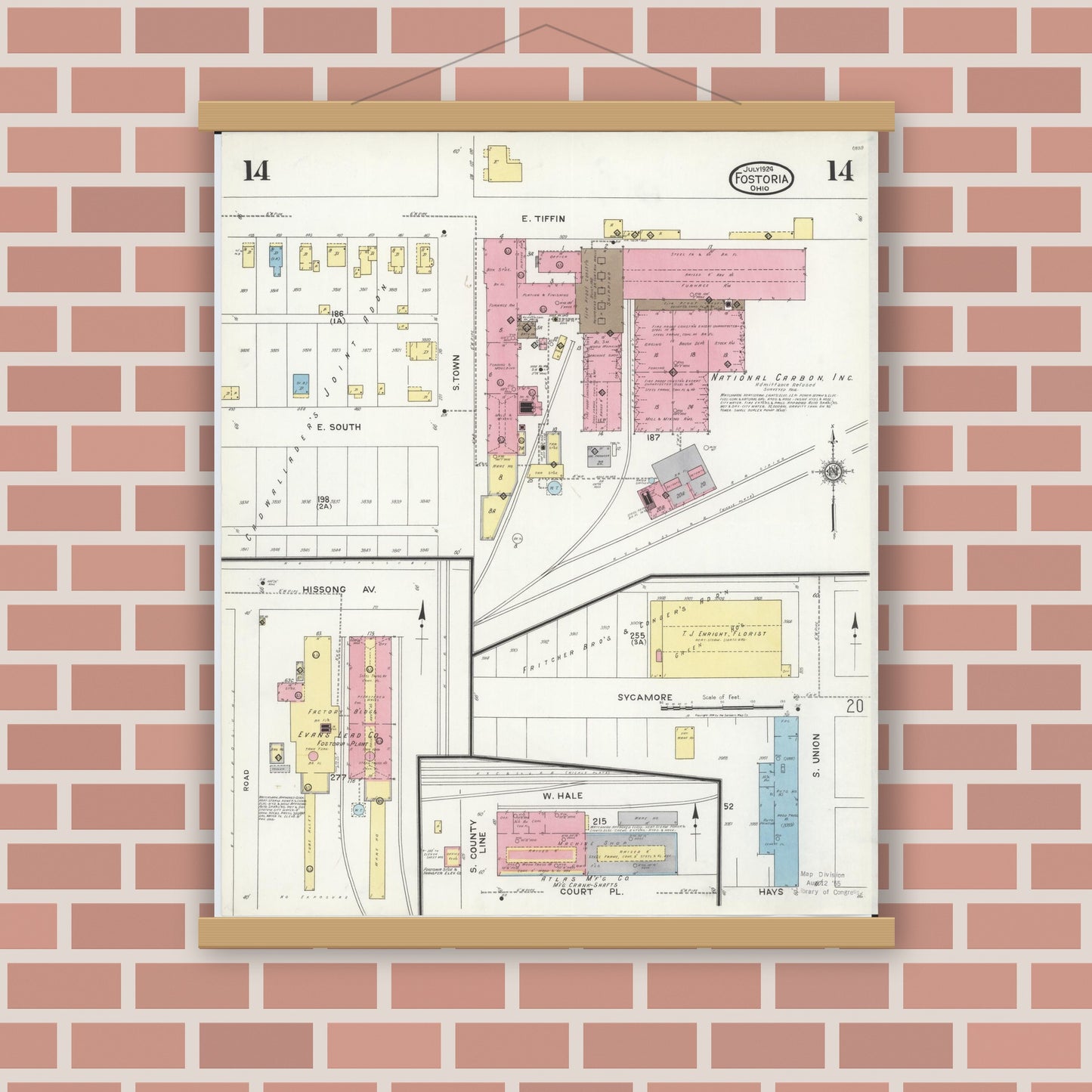 Old map wall art mockup — magnetic wood frame on brick wall — Sanborn Fire Insurance Map from Fostoria, Seneca, Hancock, And Wood Counties, Ohio (1924), Sheet #0014