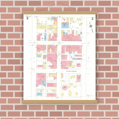 Old map wall art mockup — magnetic wood frame on brick wall — Sanborn Fire Insurance Map from Sheldon, O'Brien County, Iowa (1933), Sheet #0002