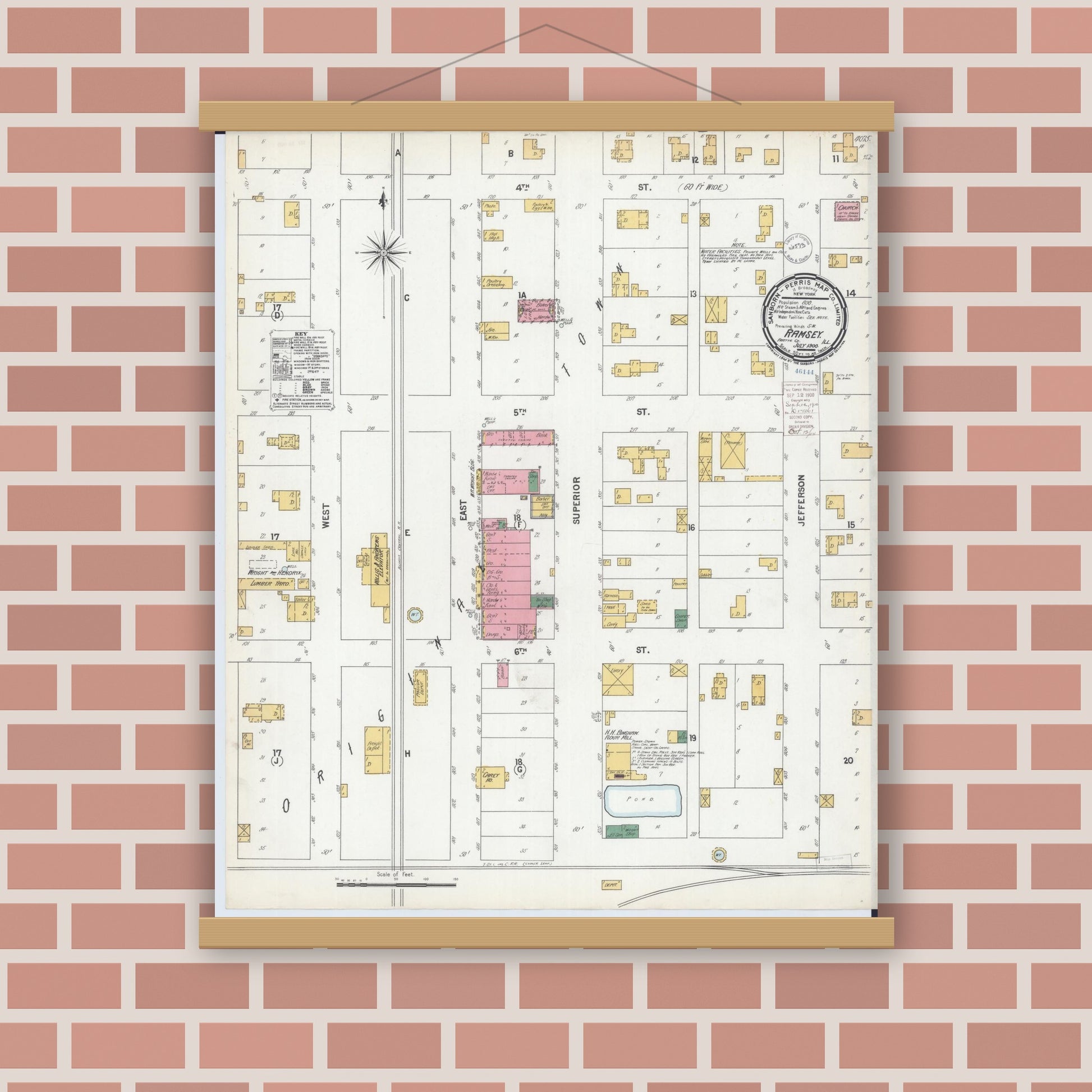 Old map wall art mockup — magnetic wood frame on brick wall — Sanborn Fire Insurance Map from Ramsey, Fayette County, Illinois (1900), Sheet #0001