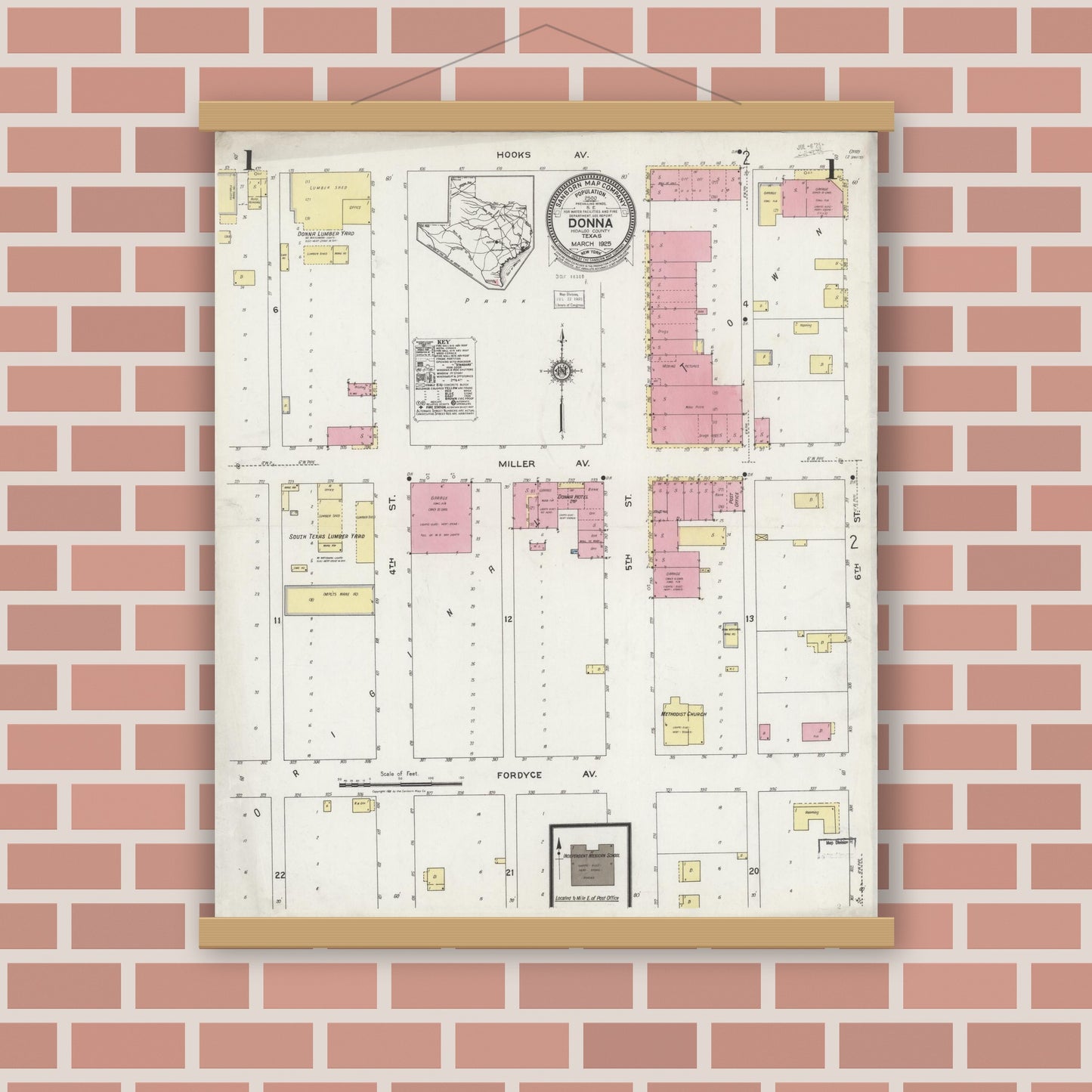 Old map wall art mockup — magnetic wood frame on brick wall — Sanborn Fire Insurance Map from Donna, Hidalgo County, Texas (1925), Sheet #0001