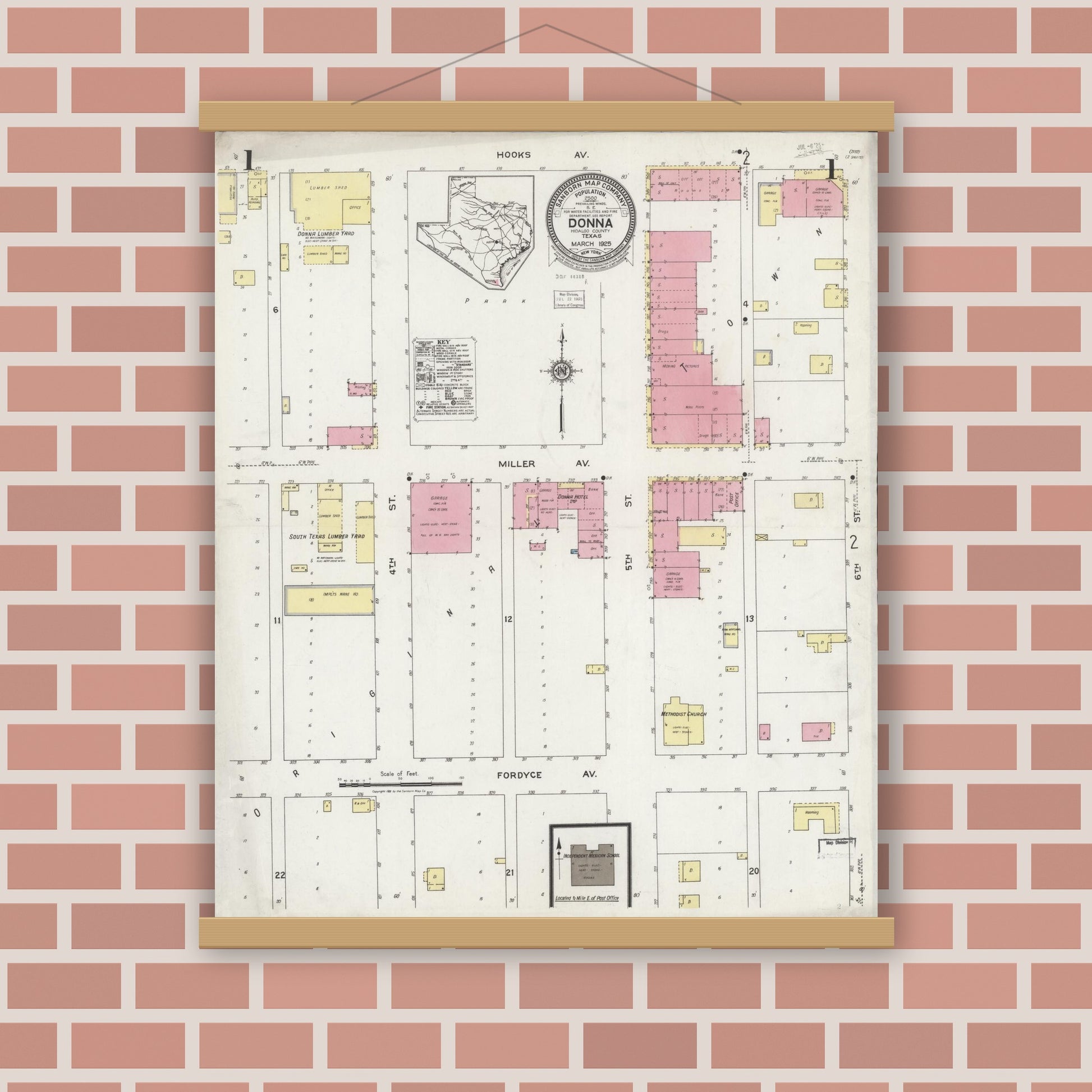 Old map wall art mockup — magnetic wood frame on brick wall — Sanborn Fire Insurance Map from Donna, Hidalgo County, Texas (1925), Sheet #0001