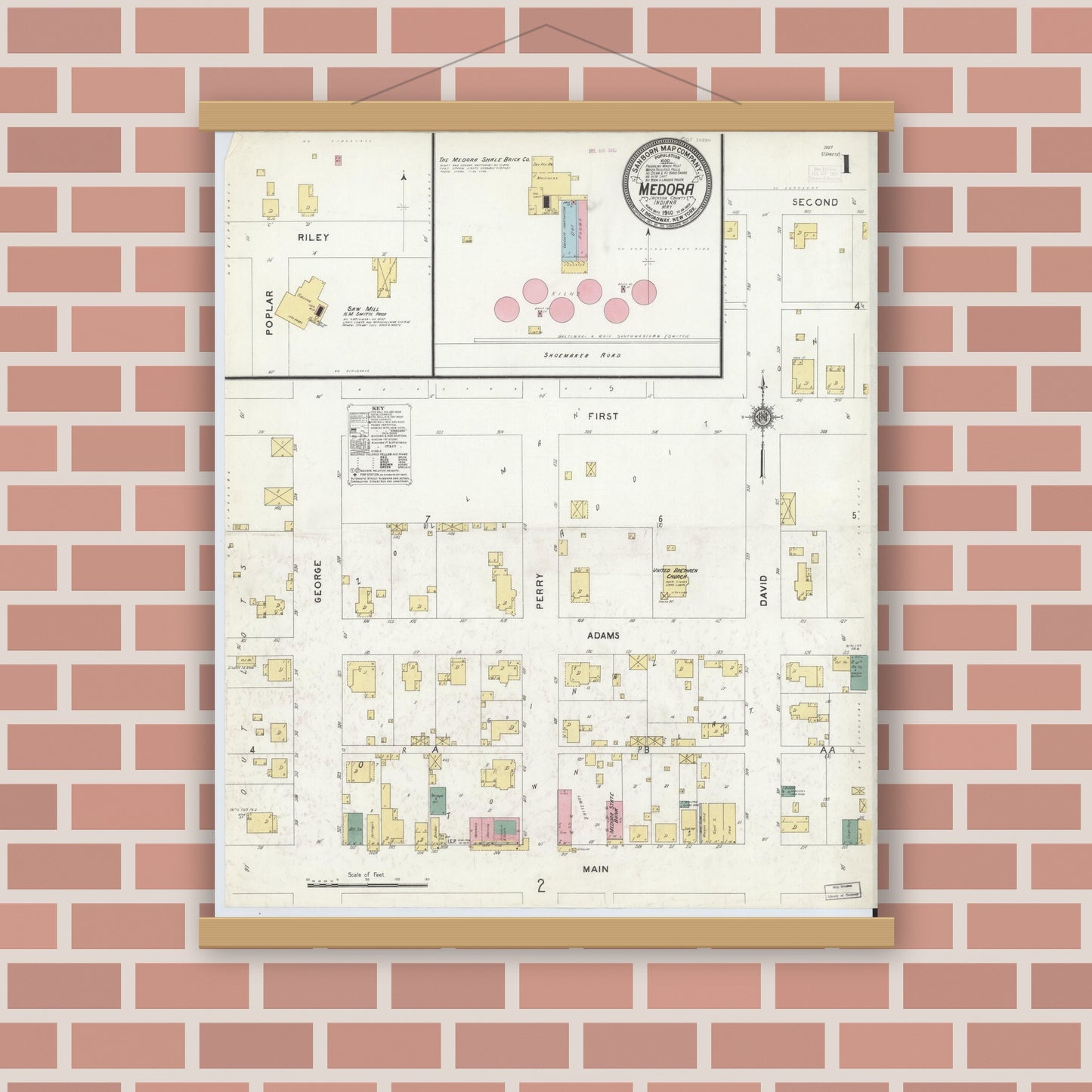 Old map wall art mockup — magnetic wood frame on brick wall — Sanborn Fire Insurance Map from Medora, Jackson County, Indiana (1910) - Complete Map Set