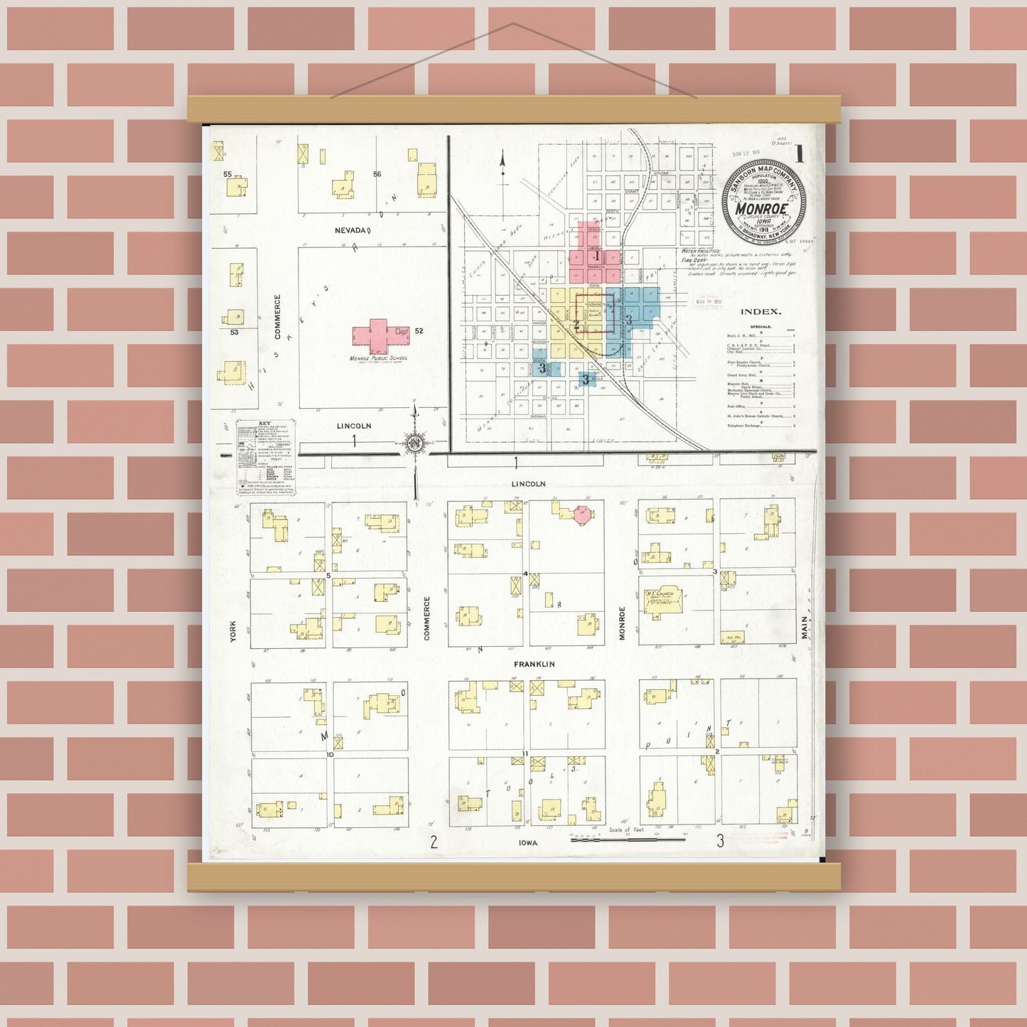 Old map wall art mockup — magnetic wood frame on brick wall — Sanborn Fire Insurance Map from Monroe, Jasper County, Iowa (1911), Sheet #0001