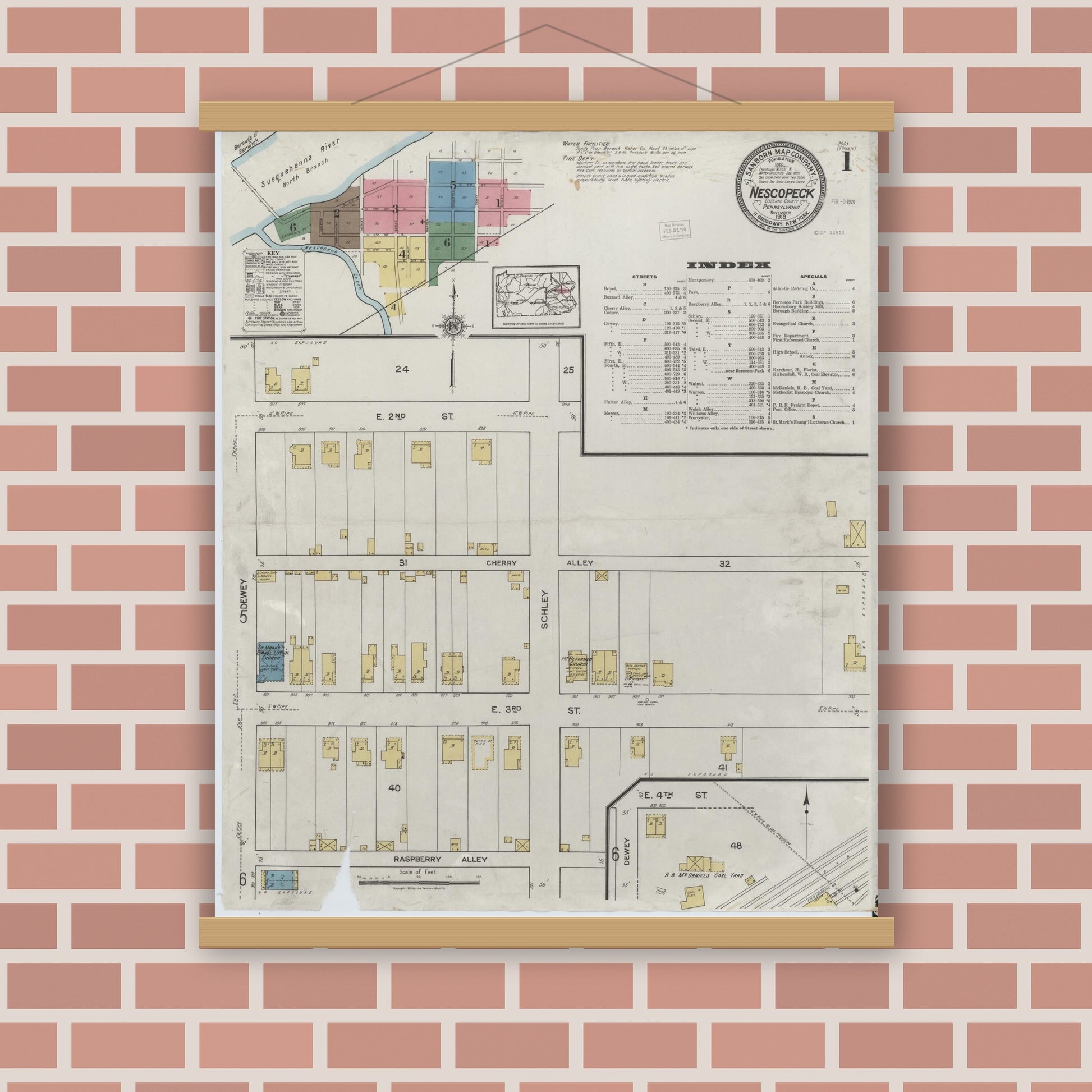 Old map wall art mockup — magnetic wood frame on brick wall — Sanborn Fire Insurance Map from Nescopeck, Luzerne County, Pennsylvania (1919), Sheet #0001