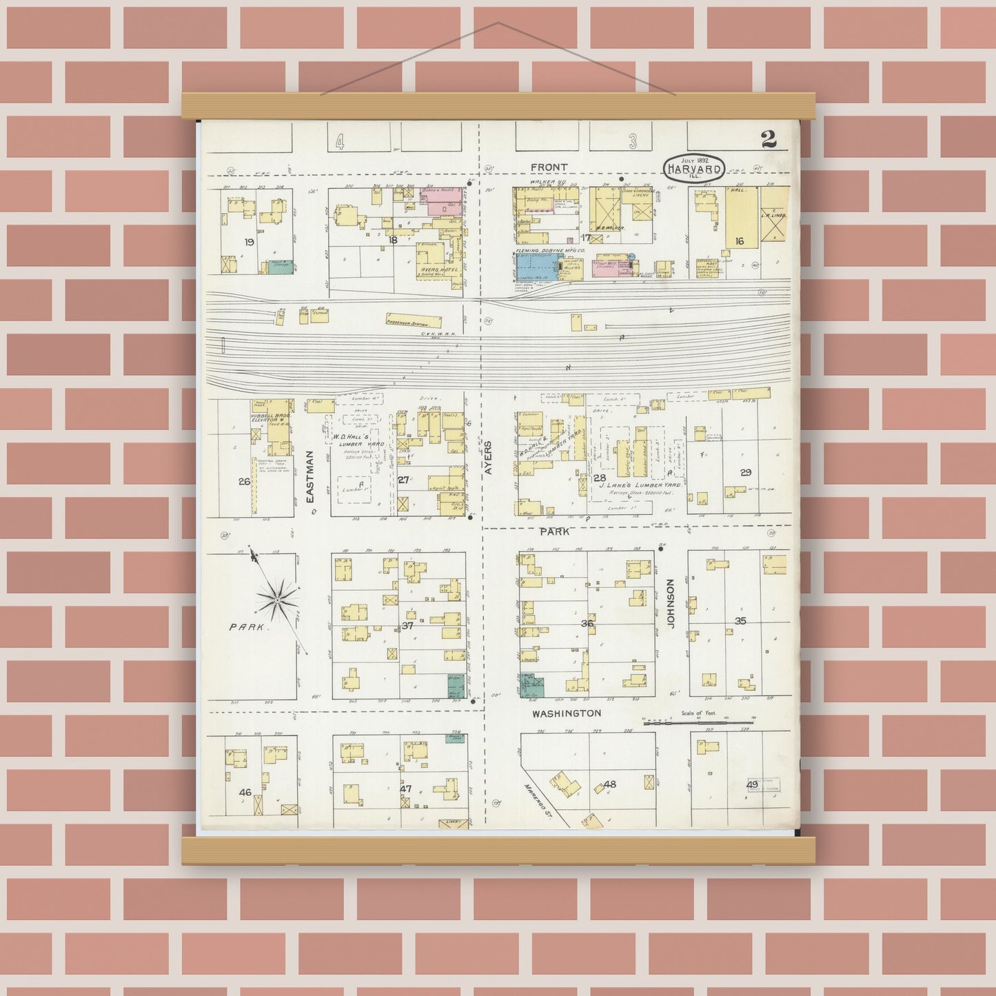 Old map wall art mockup — magnetic wood frame on brick wall — Sanborn Fire Insurance Map from Harvard, McHenry County, Illinois (1892), Sheet #0002