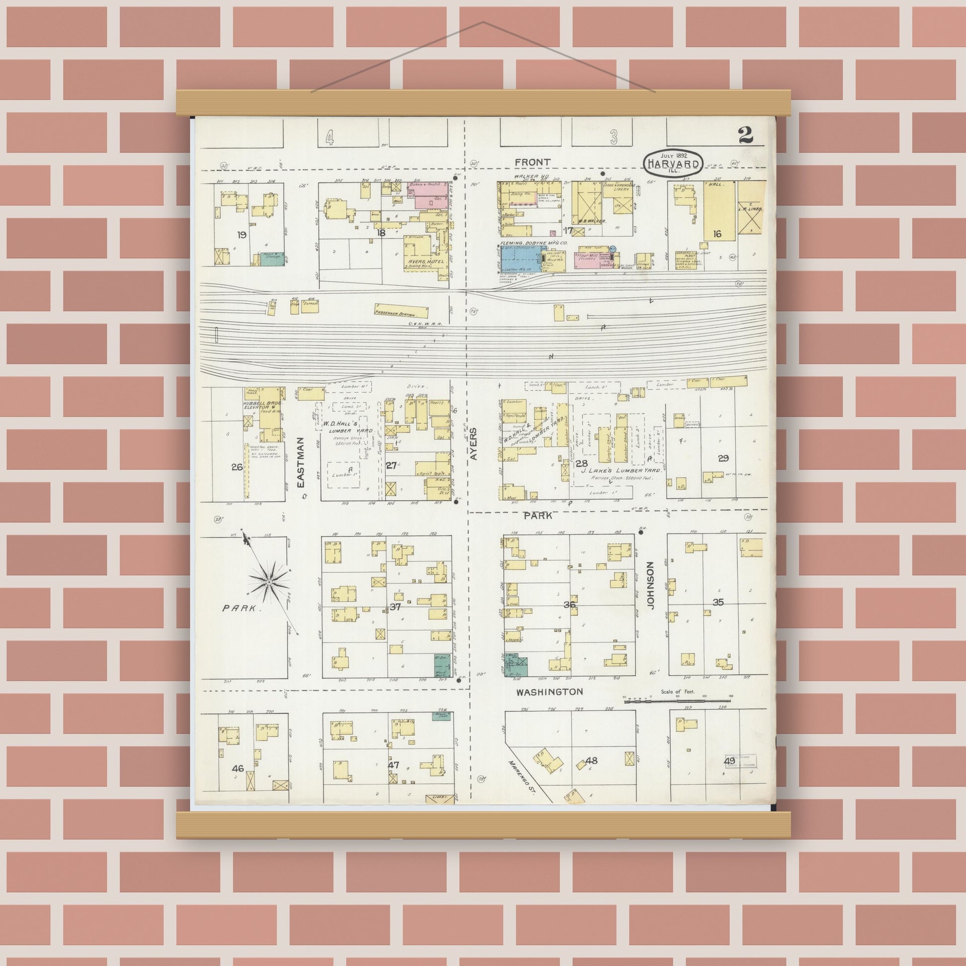 Old map wall art mockup — magnetic wood frame on brick wall — Sanborn Fire Insurance Map from Harvard, McHenry County, Illinois (1892), Sheet #0002