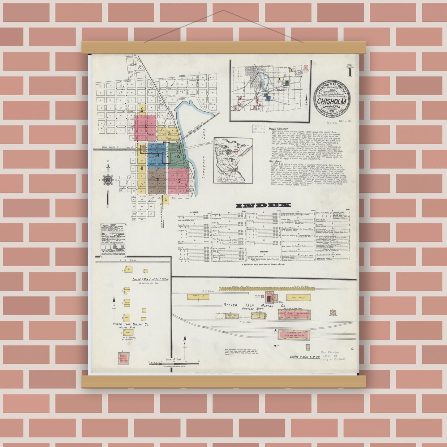 Old map wall art mockup — magnetic wood frame on brick wall — Sanborn Fire Insurance Map from Chisholm, Saint Louis County, Minnesota (1921), Sheet #0001