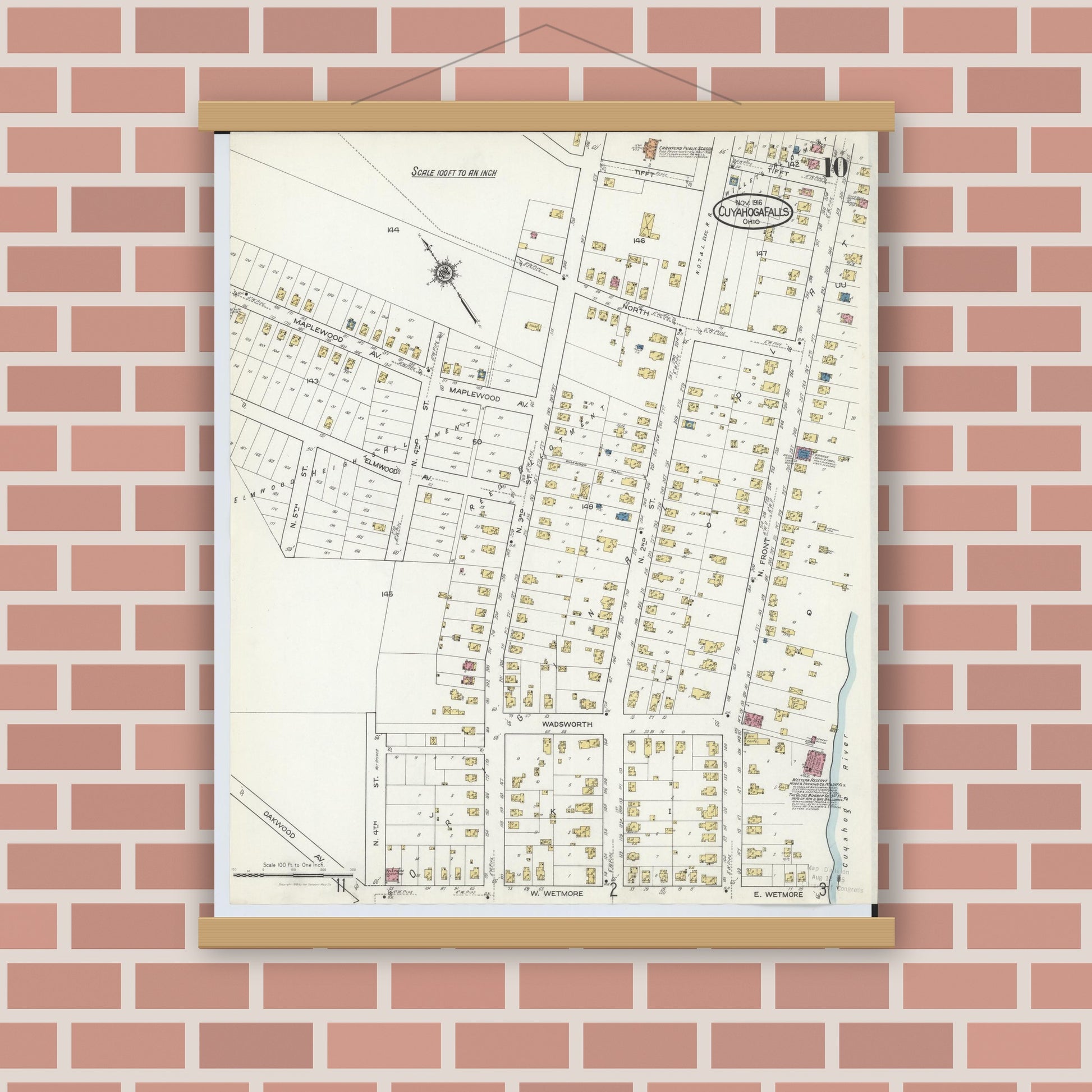 Old map wall art mockup — magnetic wood frame on brick wall — Sanborn Fire Insurance Map from Cuyahoga Falls, Summit County, Ohio (1916), Sheet #0010