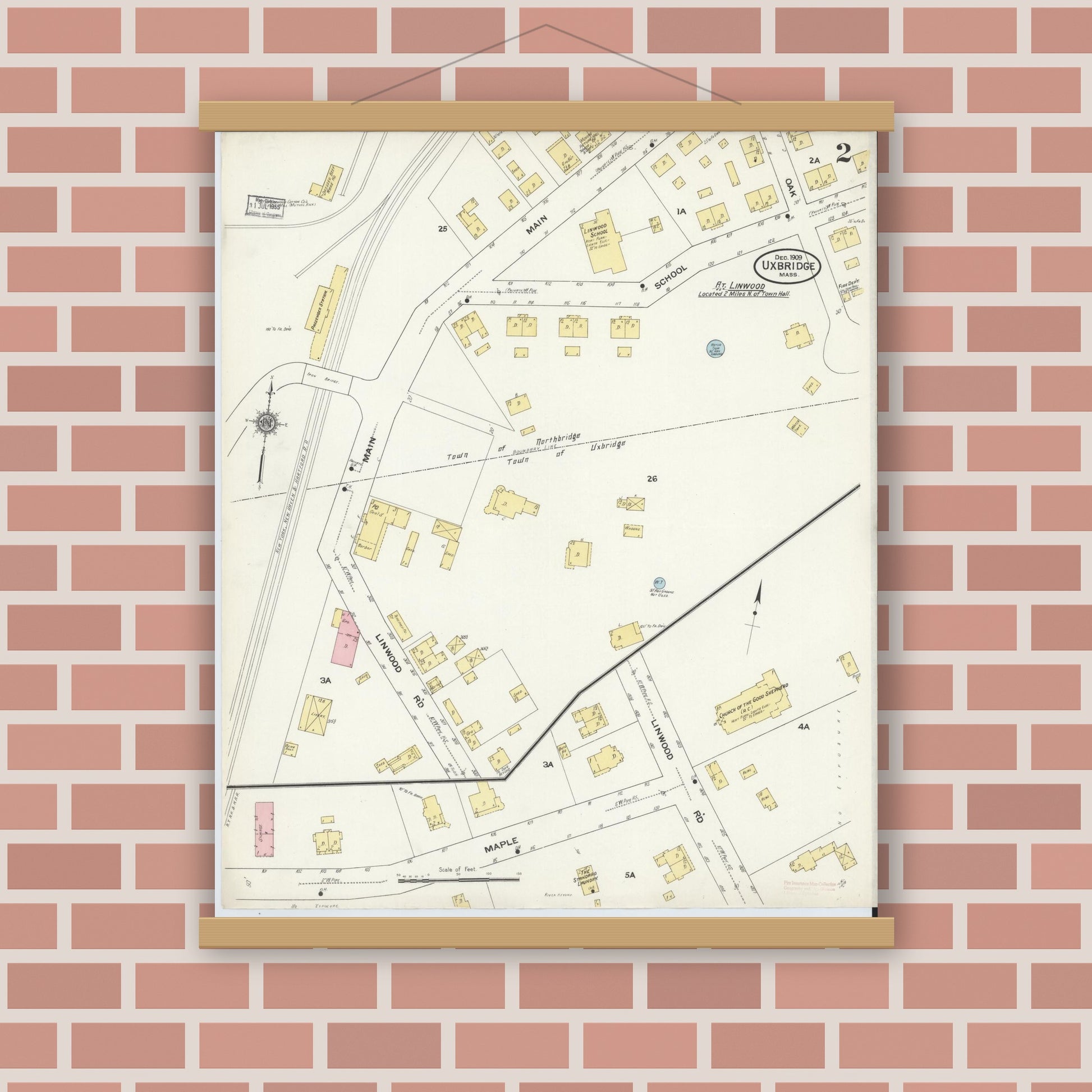 Old map wall art mockup — magnetic wood frame on brick wall — Sanborn Fire Insurance Map from Uxbridge, Worcester County, Massachusetts (1909), Sheet #0002