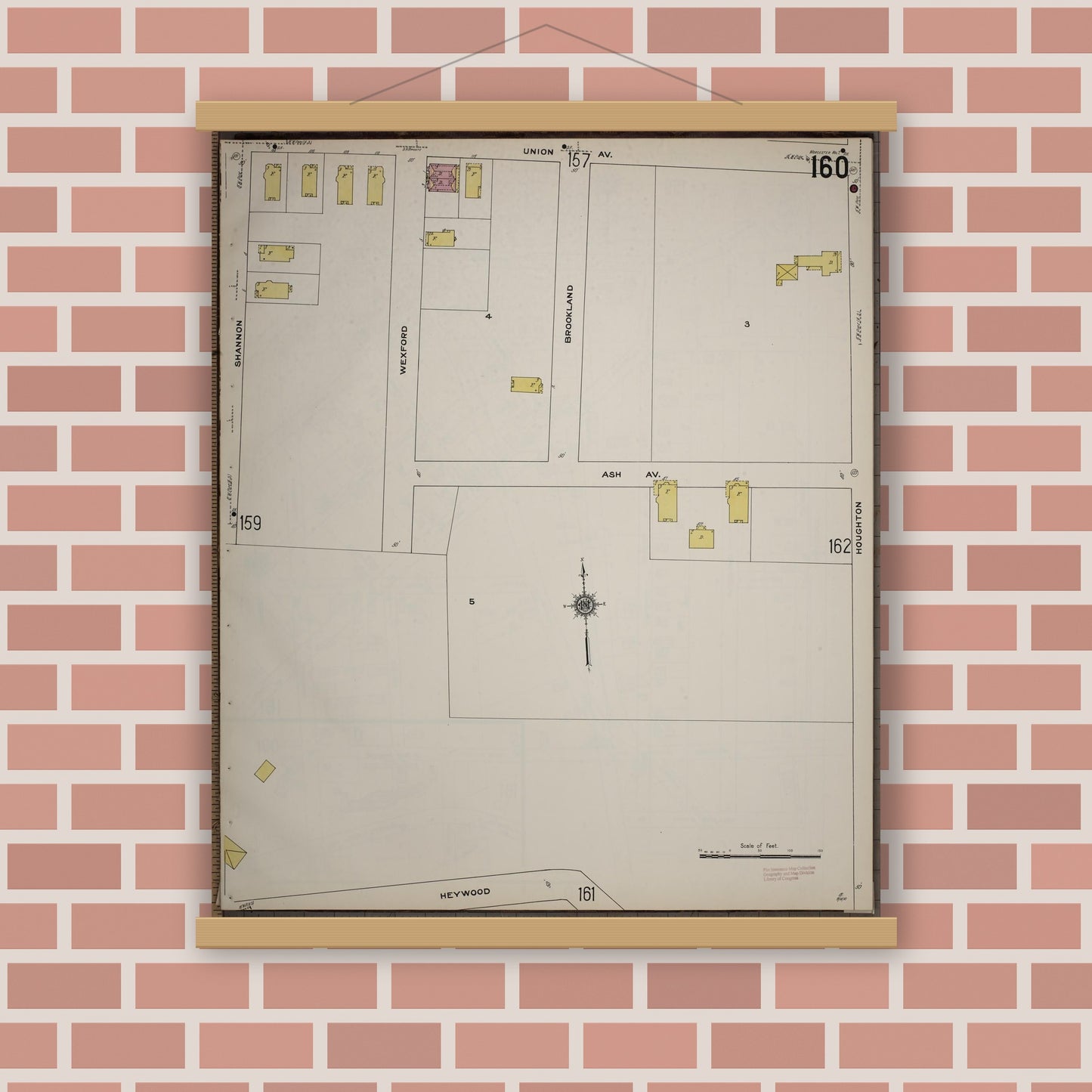 Old map wall art mockup — magnetic wood frame on brick wall — Sanborn Fire Insurance Map from Worcester, Worcester County, Massachusetts (1910), Sheet #0160
