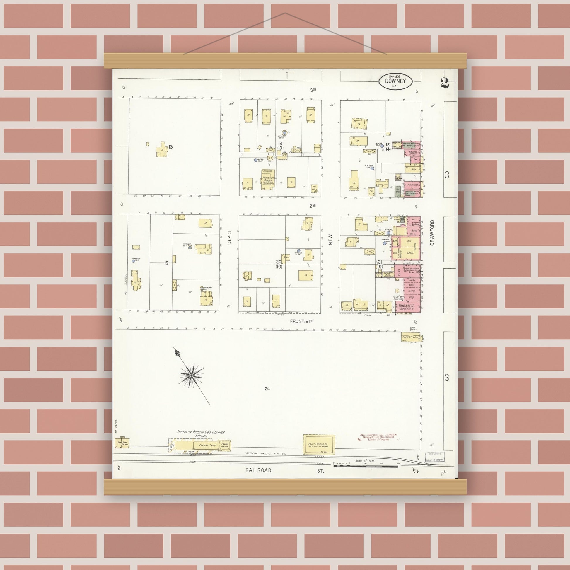 Old map wall art mockup — magnetic wood frame on brick wall — Sanborn Fire Insurance Map from Downey, Los Angeles County, California (1907), Sheet #0002