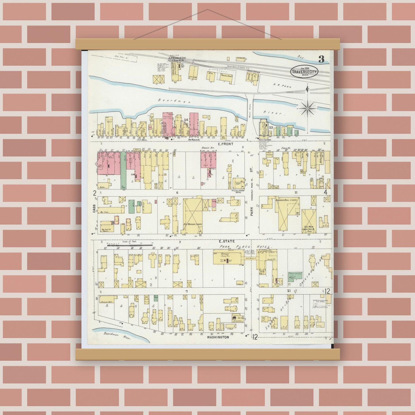 Old map wall art mockup — magnetic wood frame on brick wall — Sanborn Fire Insurance Map from Traverse City, Grand Traverse County, Michigan (1899), Sheet #0003