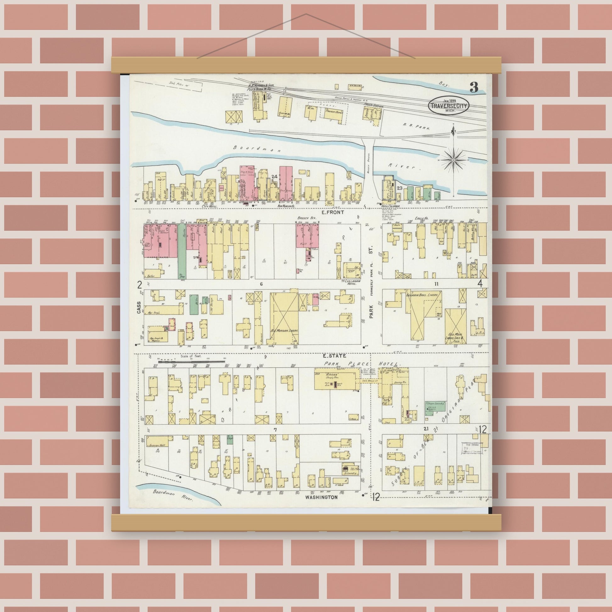 Old map wall art mockup — magnetic wood frame on brick wall — Sanborn Fire Insurance Map from Traverse City, Grand Traverse County, Michigan (1899), Sheet #0003