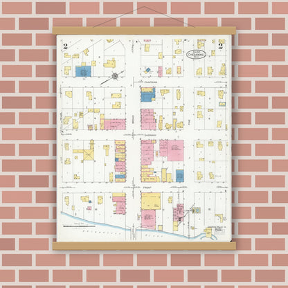 Old map wall art mockup — magnetic wood frame on brick wall — Sanborn Fire Insurance Map from Chesaning, Saginaw County, Michigan (1925), Sheet #0002