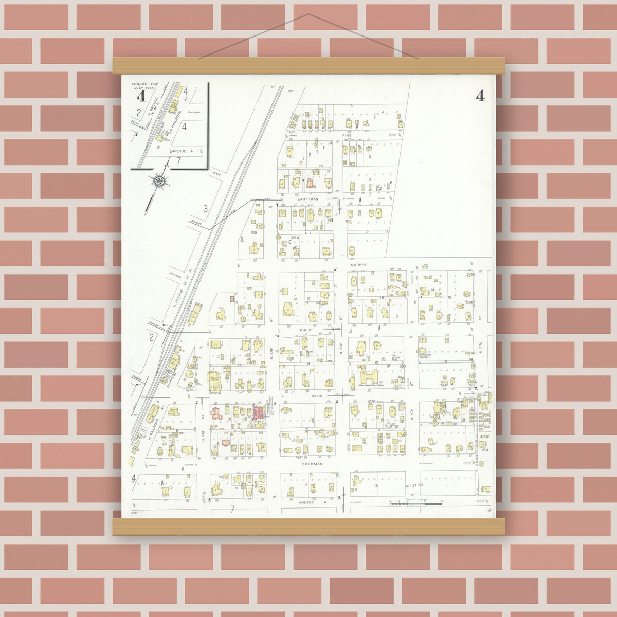 Old map wall art mockup — magnetic wood frame on brick wall — Sanborn Fire Insurance Map from Conroe, Montgomery County, Texas (1938), Sheet #0004