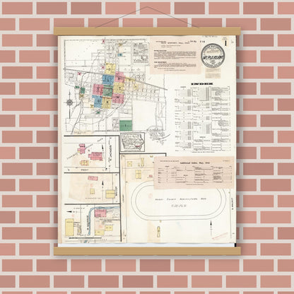Old map wall art mockup — magnetic wood frame on brick wall — Sanborn Fire Insurance Map from Mount Pleasant, Henry County, Iowa (1942), Sheet #0001