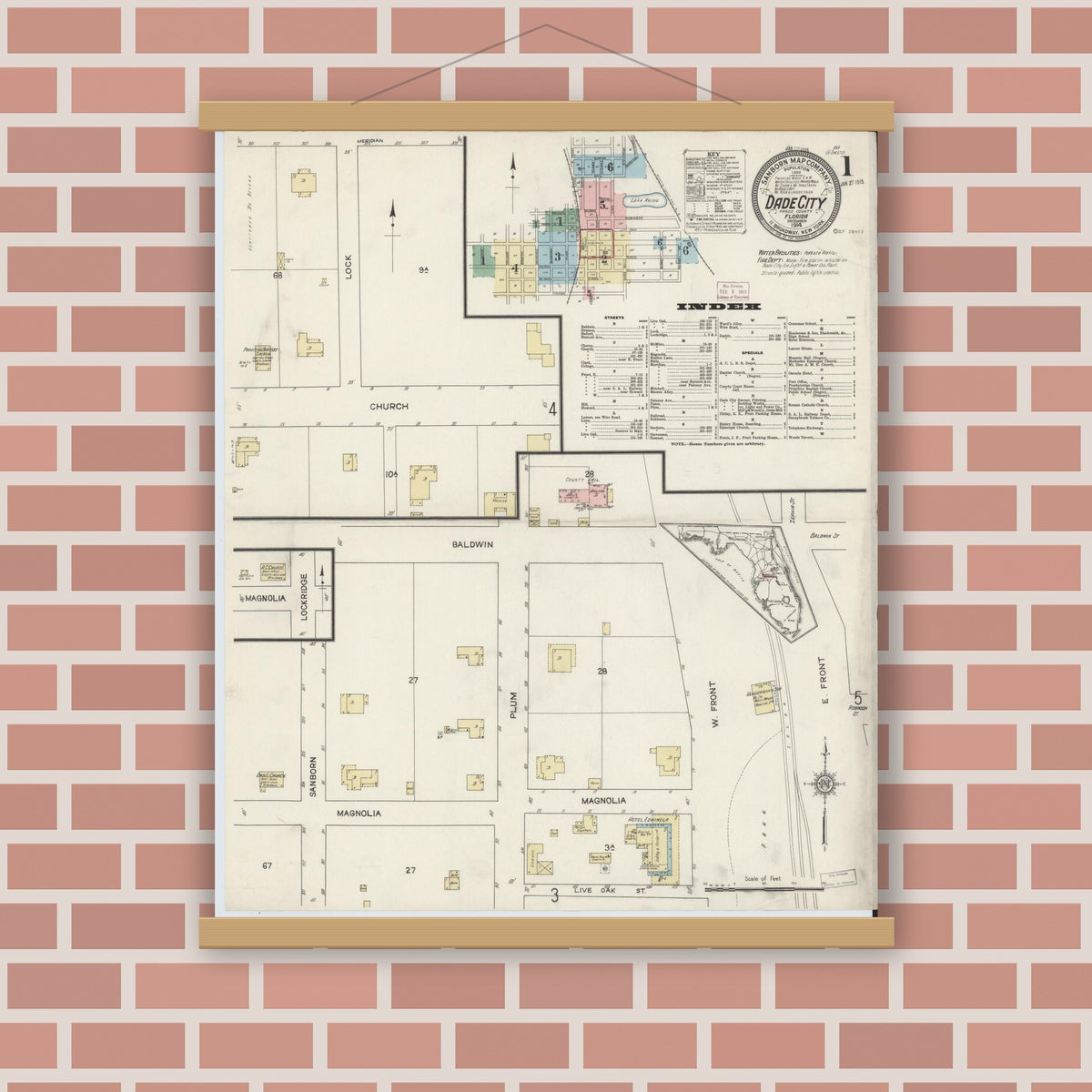 Old map wall art mockup — magnetic wood frame on brick wall — Sanborn Fire Insurance Map from Dade City, Pasco County, Florida (1914), Sheet #0001