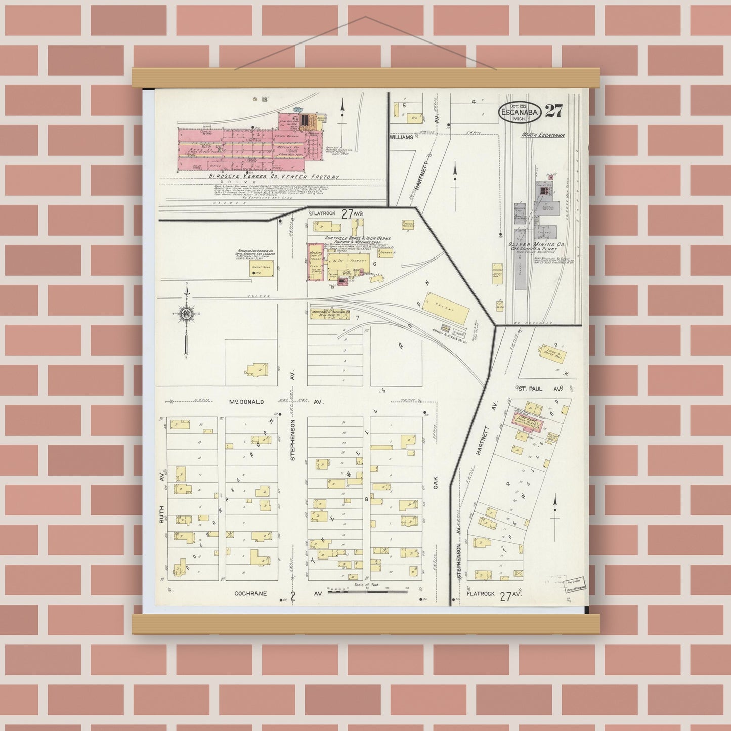 Old map wall art mockup — magnetic wood frame on brick wall — Sanborn Fire Insurance Map from Escanaba, Delta County, Michigan (1913), Sheet #0027