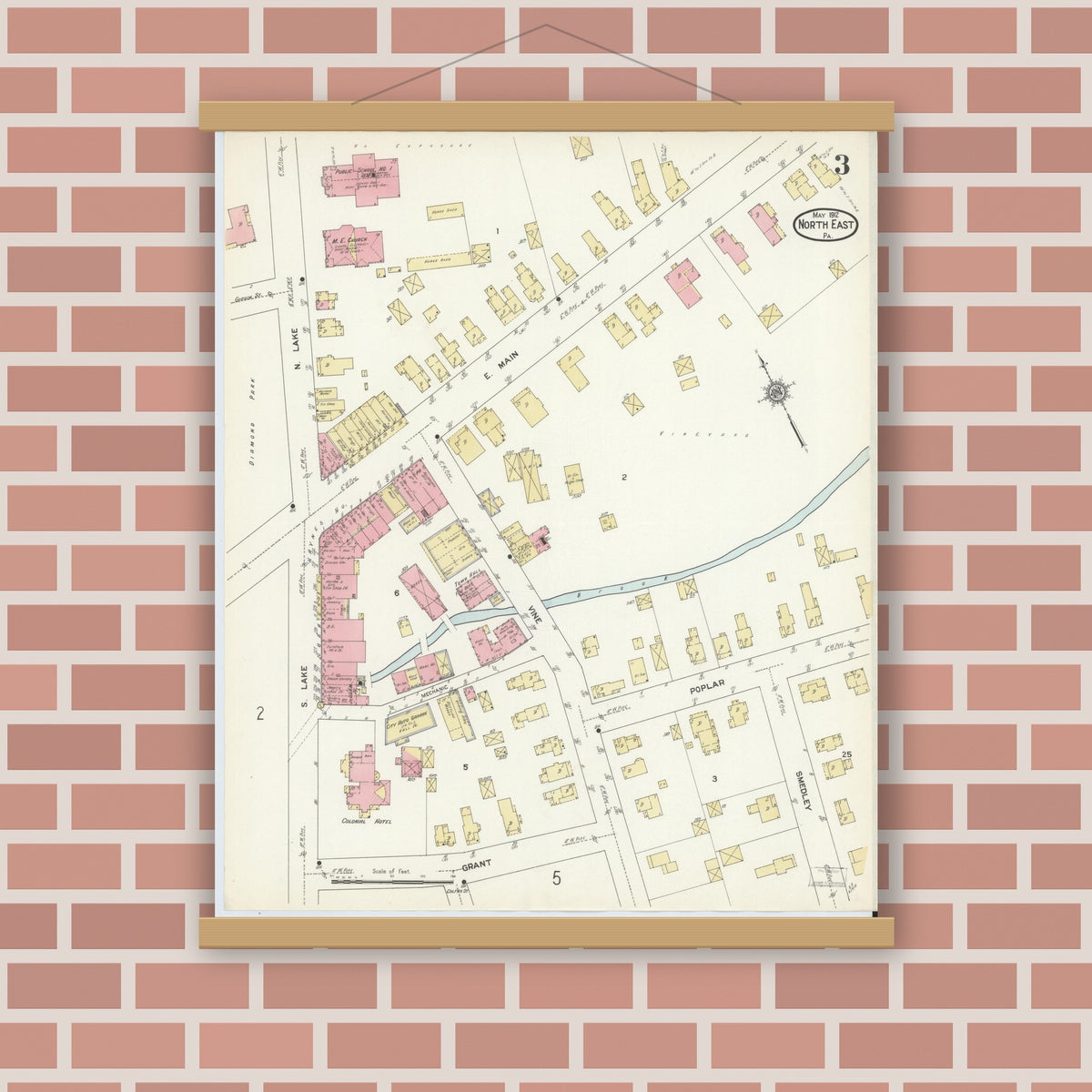 Old map wall art mockup — magnetic wood frame on brick wall — Sanborn Fire Insurance Map from North East, Erie County, Pennsylvania (1912), Sheet #0003