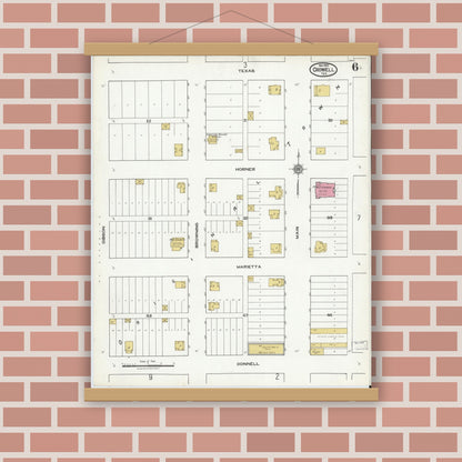 Old map wall art mockup — magnetic wood frame on brick wall — Sanborn Fire Insurance Map from Crowell, Foard County, Texas (1921), Sheet #0006