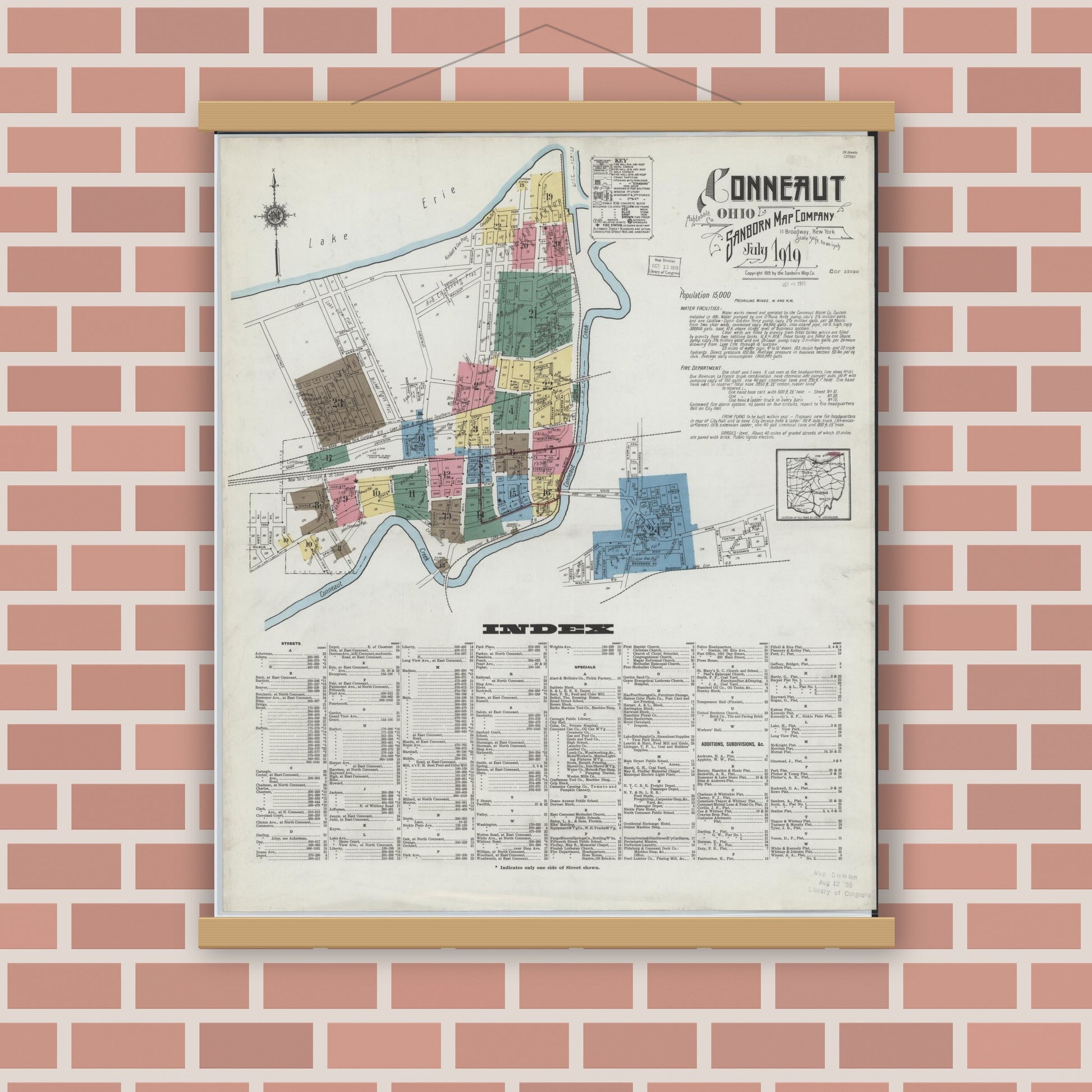 Old map wall art mockup — magnetic wood frame on brick wall — Sanborn Fire Insurance Map from Conneaut, Ashtabula County, Ohio (1919), Sheet #0001