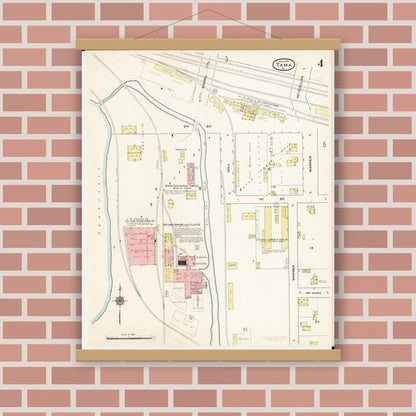 Old map wall art mockup — magnetic wood frame on brick wall — Sanborn Fire Insurance Map from Tama, Tama County, Iowa (1915), Sheet #0004