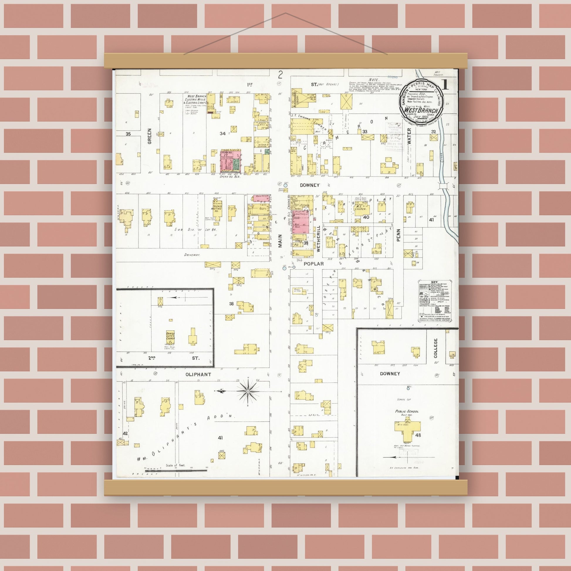 Old map wall art mockup — magnetic wood frame on brick wall — Sanborn Fire Insurance Map from West Branch, Cedar County, Iowa (1900) â€” Complete Set