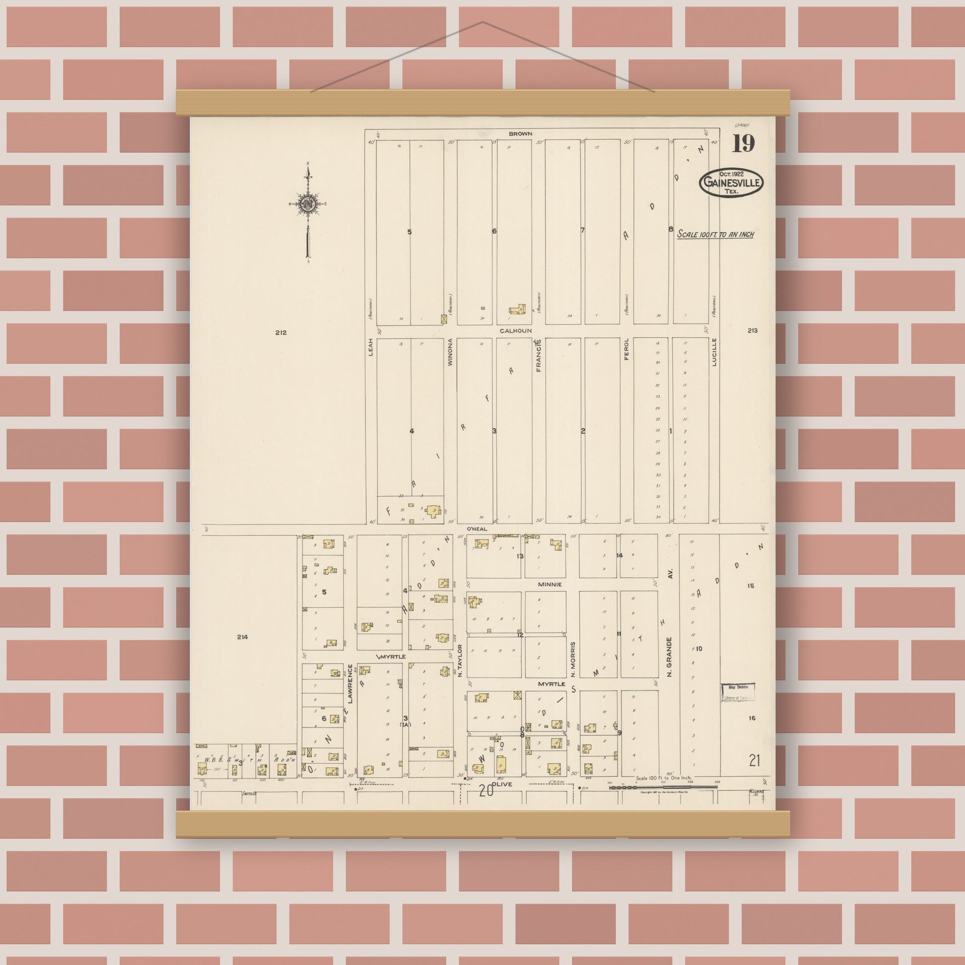 Old map wall art mockup — magnetic wood frame on brick wall — Sanborn Fire Insurance Map from Gainesville, Cooke County, Texas (1922), Sheet #0019