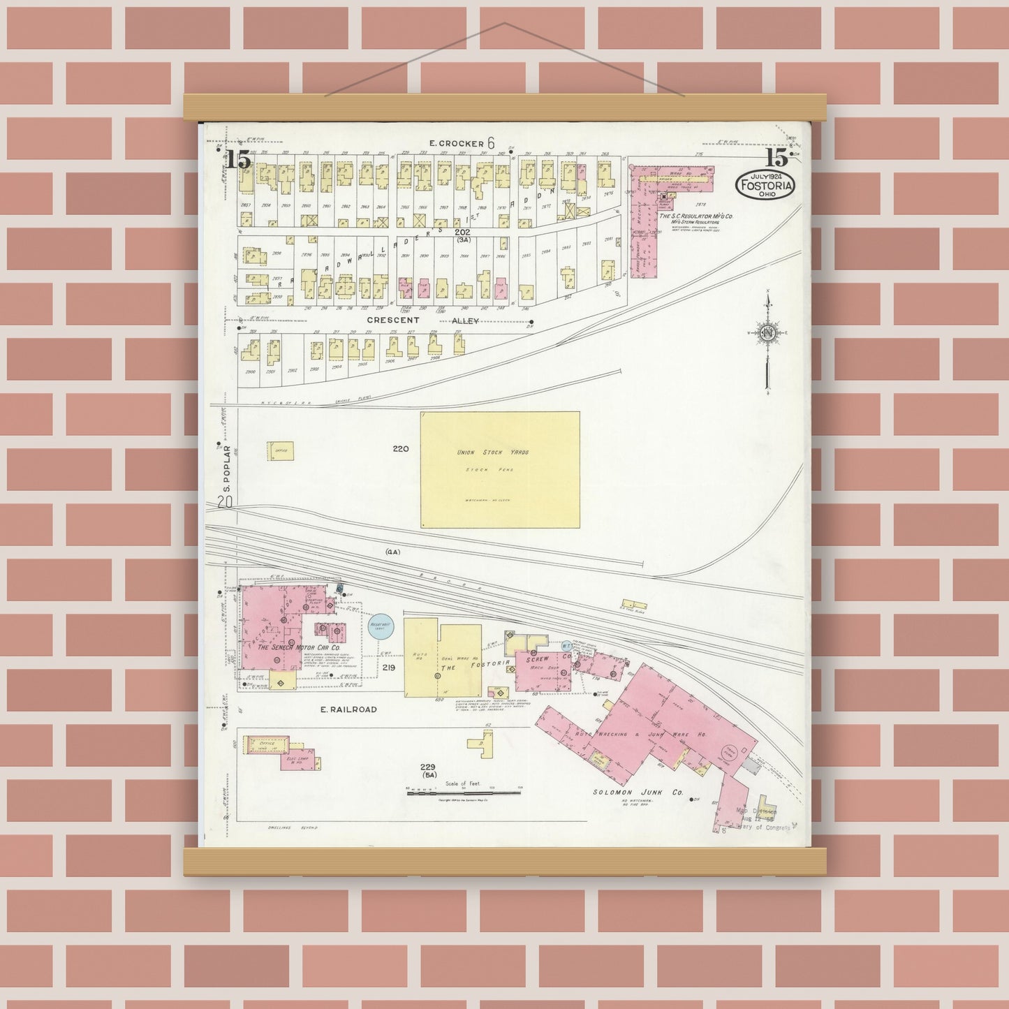 Old map wall art mockup — magnetic wood frame on brick wall — Sanborn Fire Insurance Map from Fostoria, Seneca, Hancock, And Wood Counties, Ohio (1924), Sheet #0015