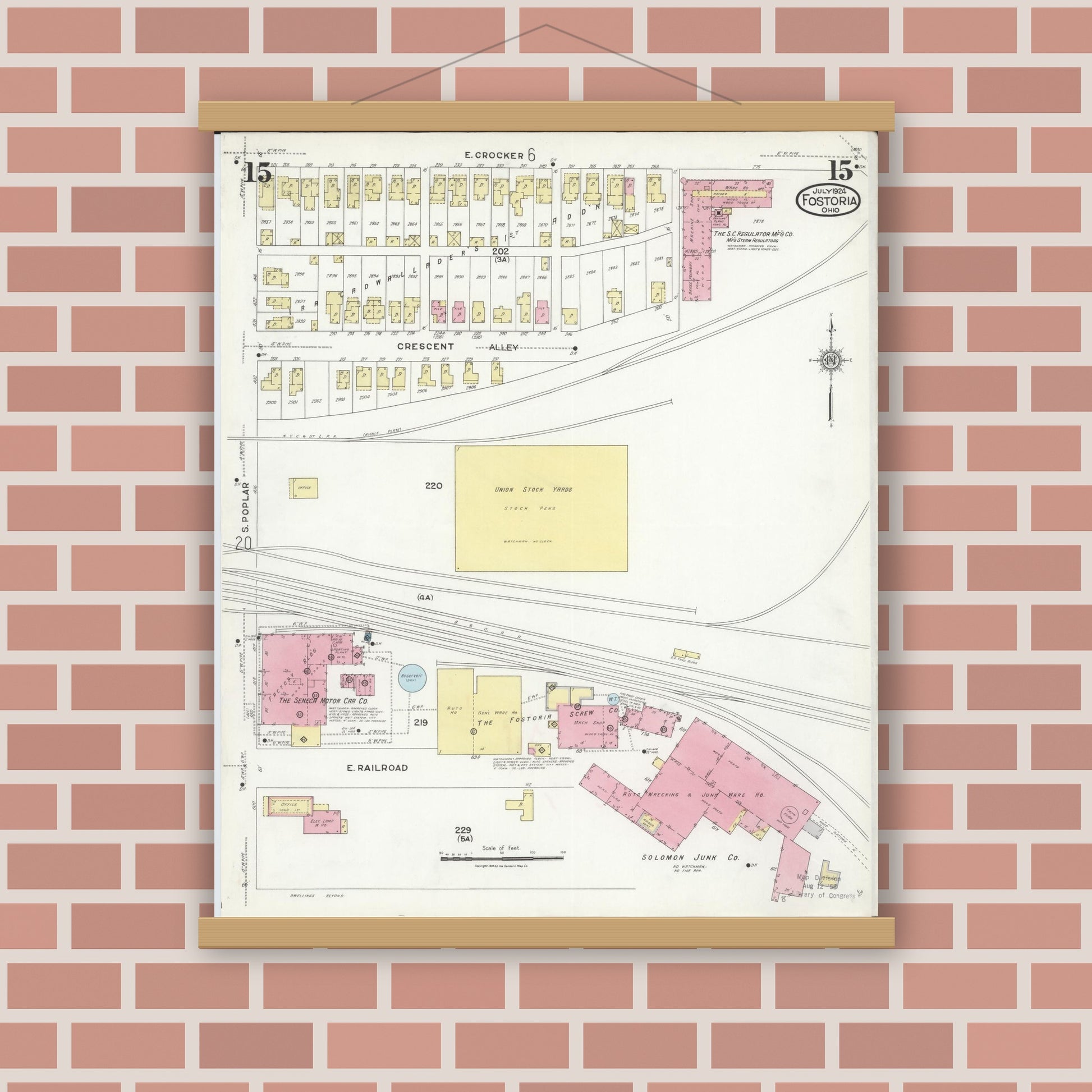 Old map wall art mockup — magnetic wood frame on brick wall — Sanborn Fire Insurance Map from Fostoria, Seneca, Hancock, And Wood Counties, Ohio (1924), Sheet #0015