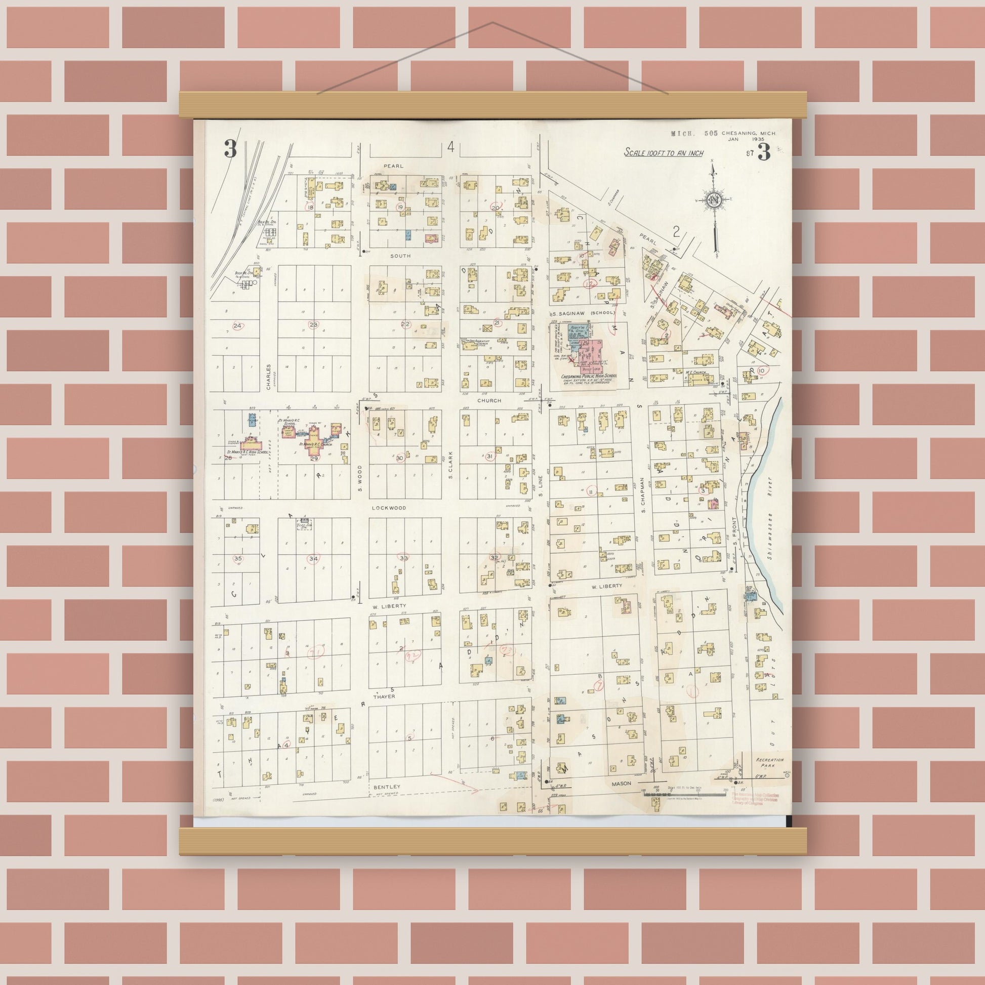Old map wall art mockup — magnetic wood frame on brick wall — Sanborn Fire Insurance Map from Chesaning, Saginaw County, Michigan (1944), Sheet #0003