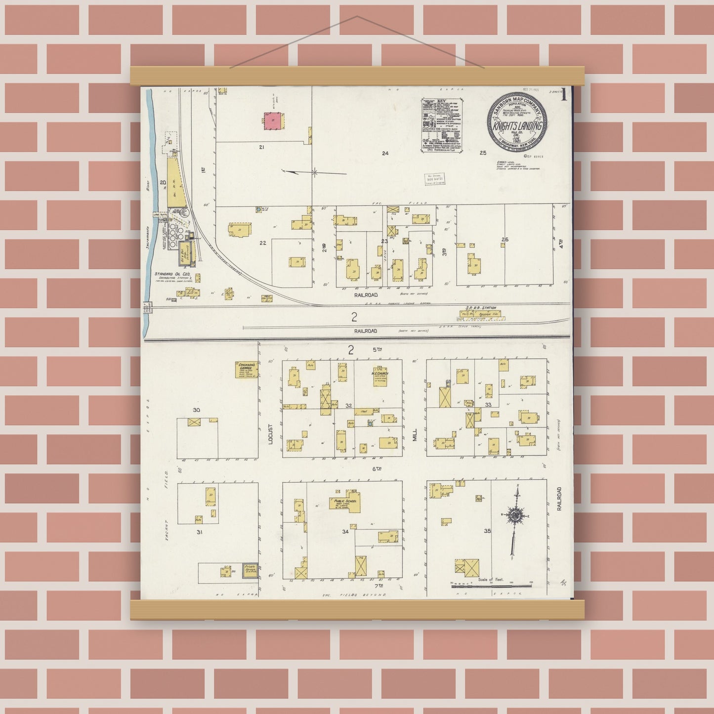 Old map wall art mockup — magnetic wood frame on brick wall — Sanborn Fire Insurance Map from Knights Landing, Yolo County, California (1921), Sheet #0001
