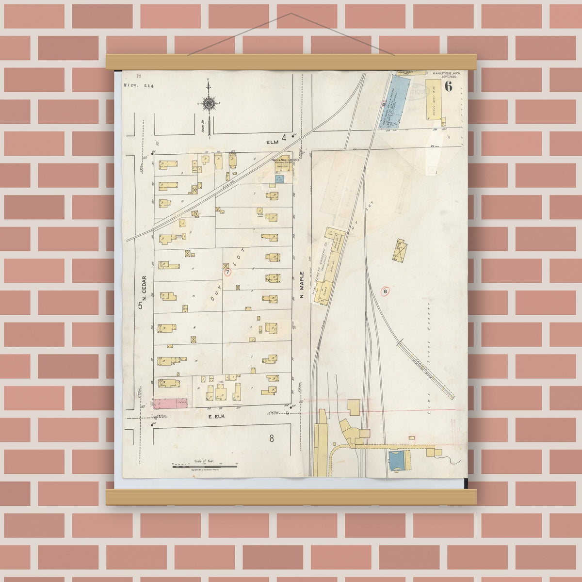 Old map wall art mockup — magnetic wood frame on brick wall — Sanborn Fire Insurance Map from Manistique, Schoolcraft County, Michigan (1950), Sheet #0006