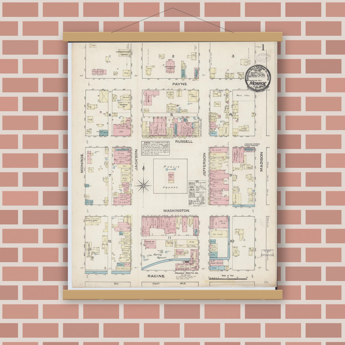 Old map wall art mockup — magnetic wood frame on brick wall — Sanborn Fire Insurance Map from Monroe, Green County, Wisconsin (1884), Sheet #0001