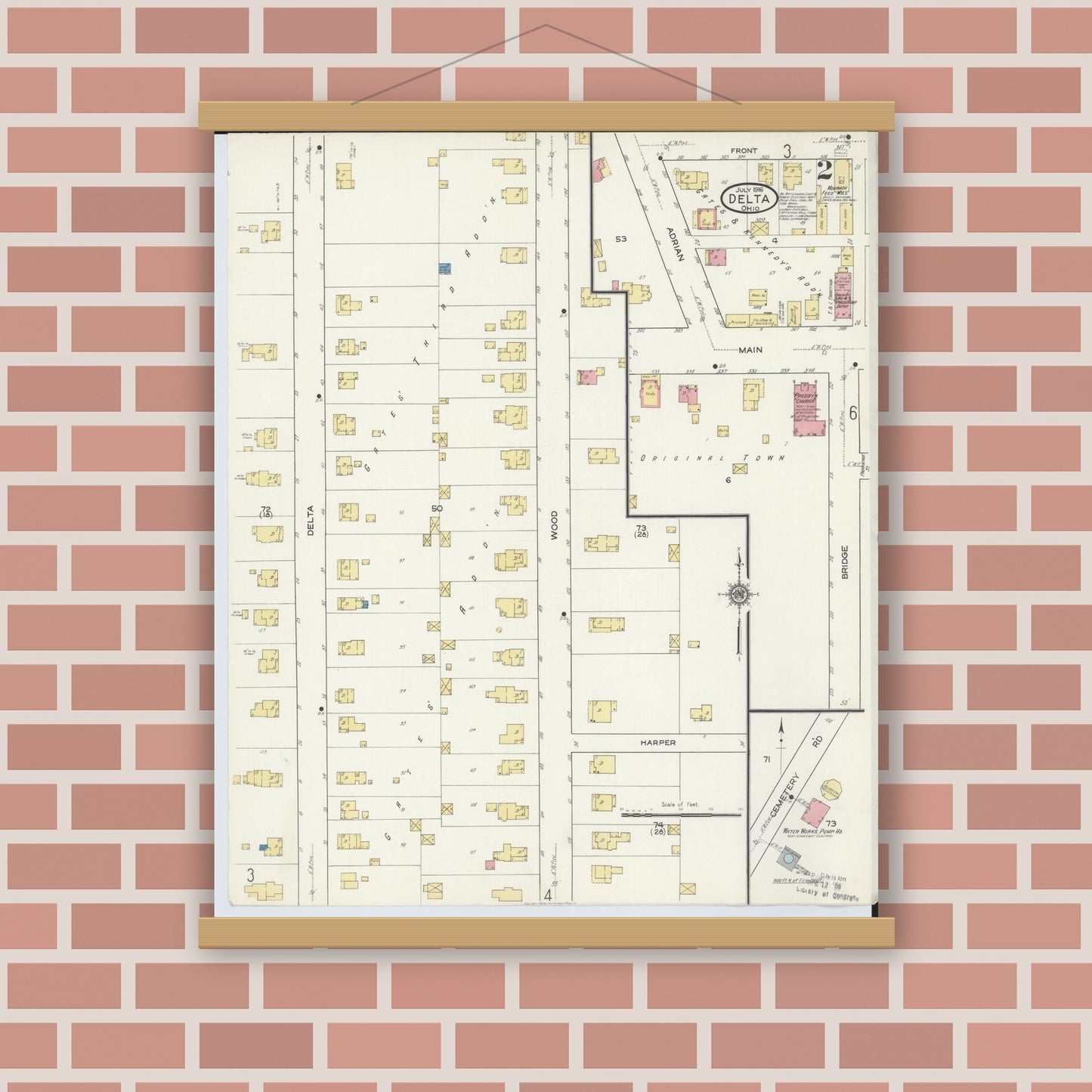 Old map wall art mockup — magnetic wood frame on brick wall — Sanborn Fire Insurance Map from Delta, Fulton County, Ohio (1916), Sheet #0002