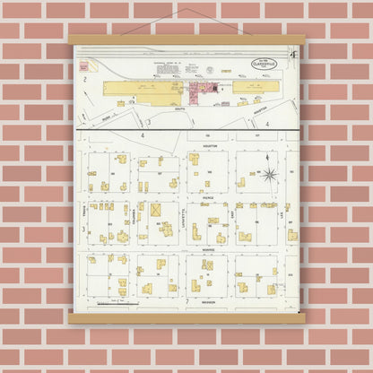 Old map wall art mockup — magnetic wood frame on brick wall — Sanborn Fire Insurance Map from Clarksville, Red River County, Texas (1906), Sheet #0004