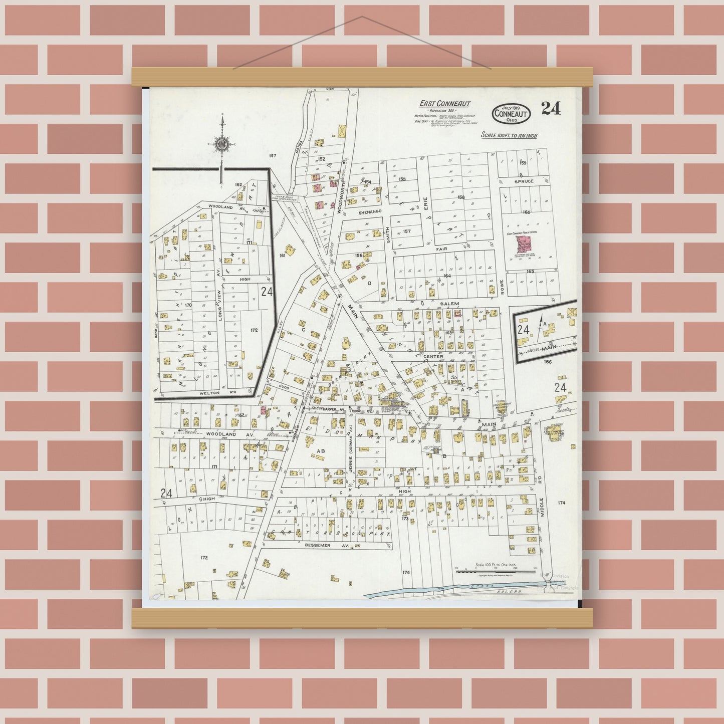 Old map wall art mockup — magnetic wood frame on brick wall — Sanborn Fire Insurance Map from Conneaut, Ashtabula County, Ohio (1919), Sheet #0024
