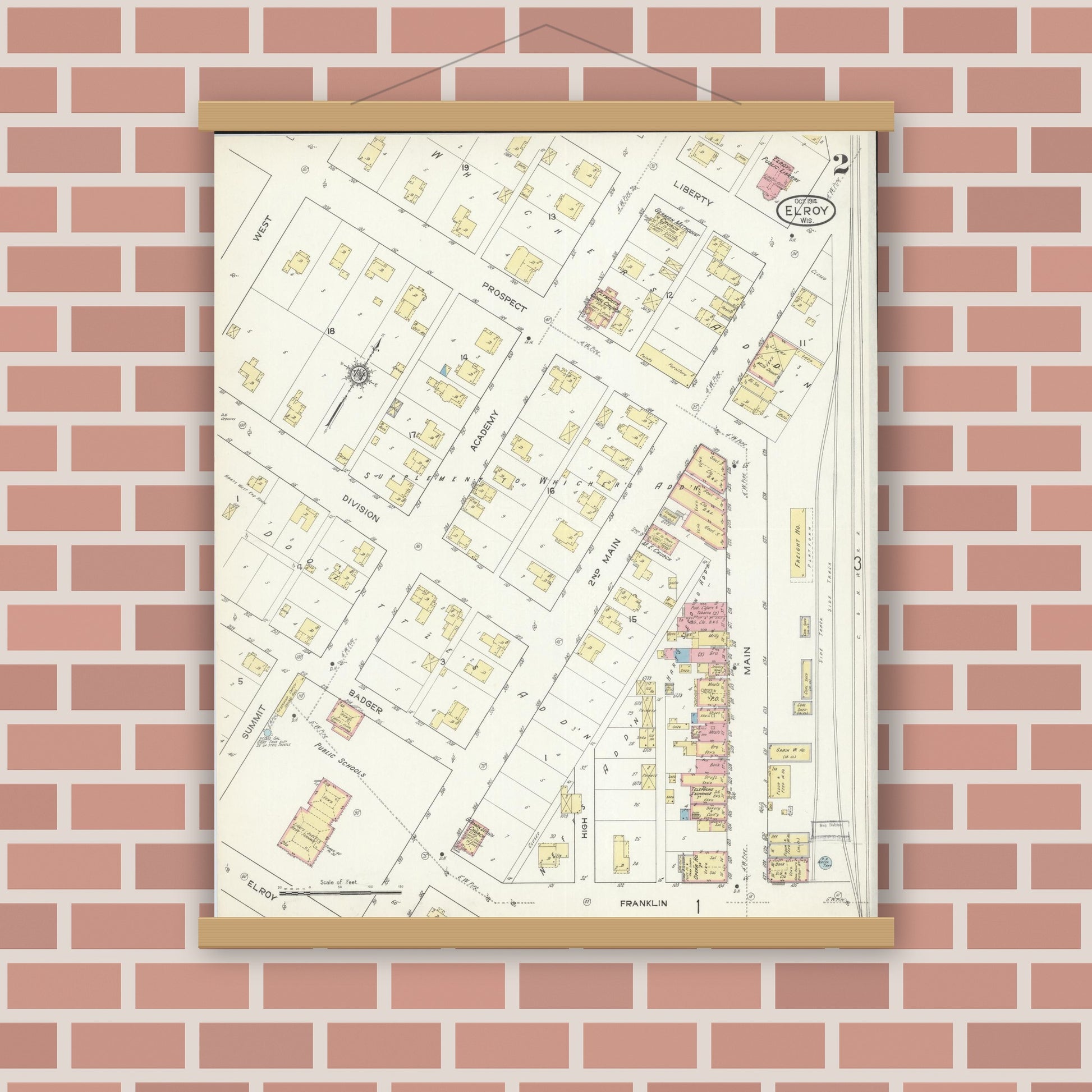 Old map wall art mockup — magnetic wood frame on brick wall — Sanborn Fire Insurance Map from Elroy, Juneau County, Wisconsin (1914), Sheet #0002