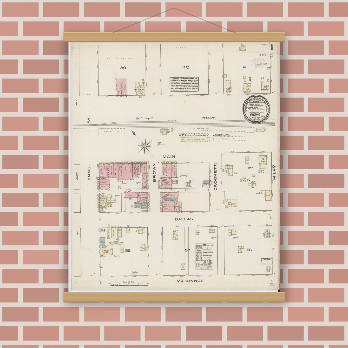 Old map wall art mockup — magnetic wood frame on brick wall — Sanborn Fire Insurance Map from Ennis, Ellis County, Texas (1885), Sheet #0001