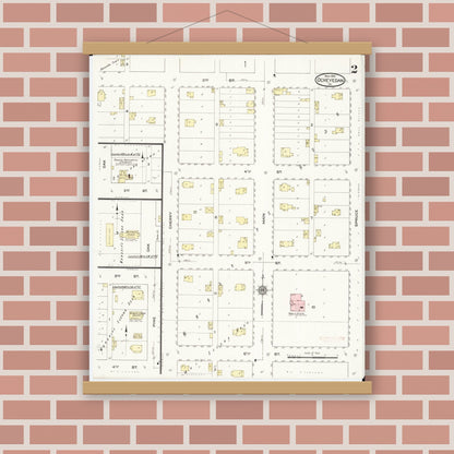Old map wall art mockup — magnetic wood frame on brick wall — Sanborn Fire Insurance Map from Ocheyedan, Osceola County, Iowa (1914), Sheet #0002